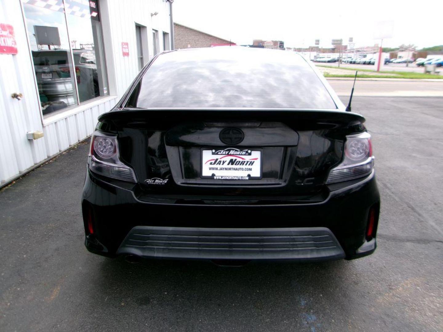 2014 BLACK SCION TC (JTKJF5C70E3) with an 2.5L engine, 6-Speed Manual transmission, located at 501 E. Columbia St., Springfield, OH, 45503, (800) 262-7122, 39.925262, -83.801796 - ***Scion TC***New Clutch***New Front and Rear Brake Pads and Rotors***Manual Transmission***SHARP***Serviced and Detailed*** Jay North Auto has offered hand picked vehicles since 1965! Our customer's enjoy a NO pressure buying experience with a small town feel. All of our vehicles get fully in - Photo#4