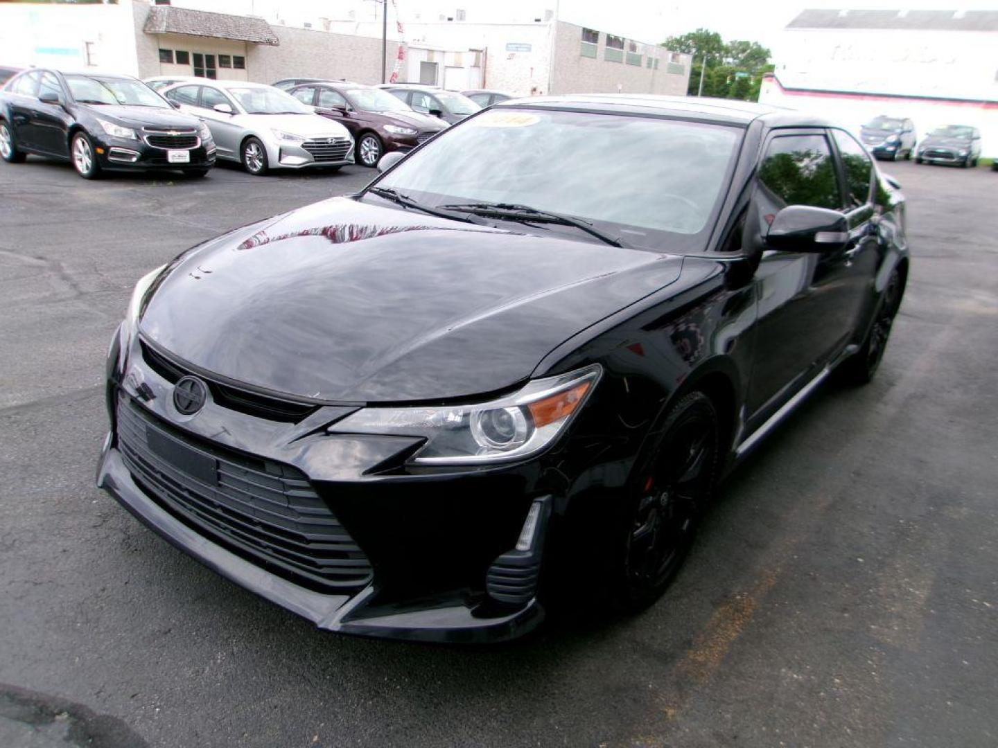 2014 BLACK SCION TC (JTKJF5C70E3) with an 2.5L engine, 6-Speed Manual transmission, located at 501 E. Columbia St., Springfield, OH, 45503, (800) 262-7122, 39.925262, -83.801796 - ***Scion TC***New Clutch***New Front and Rear Brake Pads and Rotors***Manual Transmission***SHARP***Serviced and Detailed*** Jay North Auto has offered hand picked vehicles since 1965! Our customer's enjoy a NO pressure buying experience with a small town feel. All of our vehicles get fully in - Photo#6