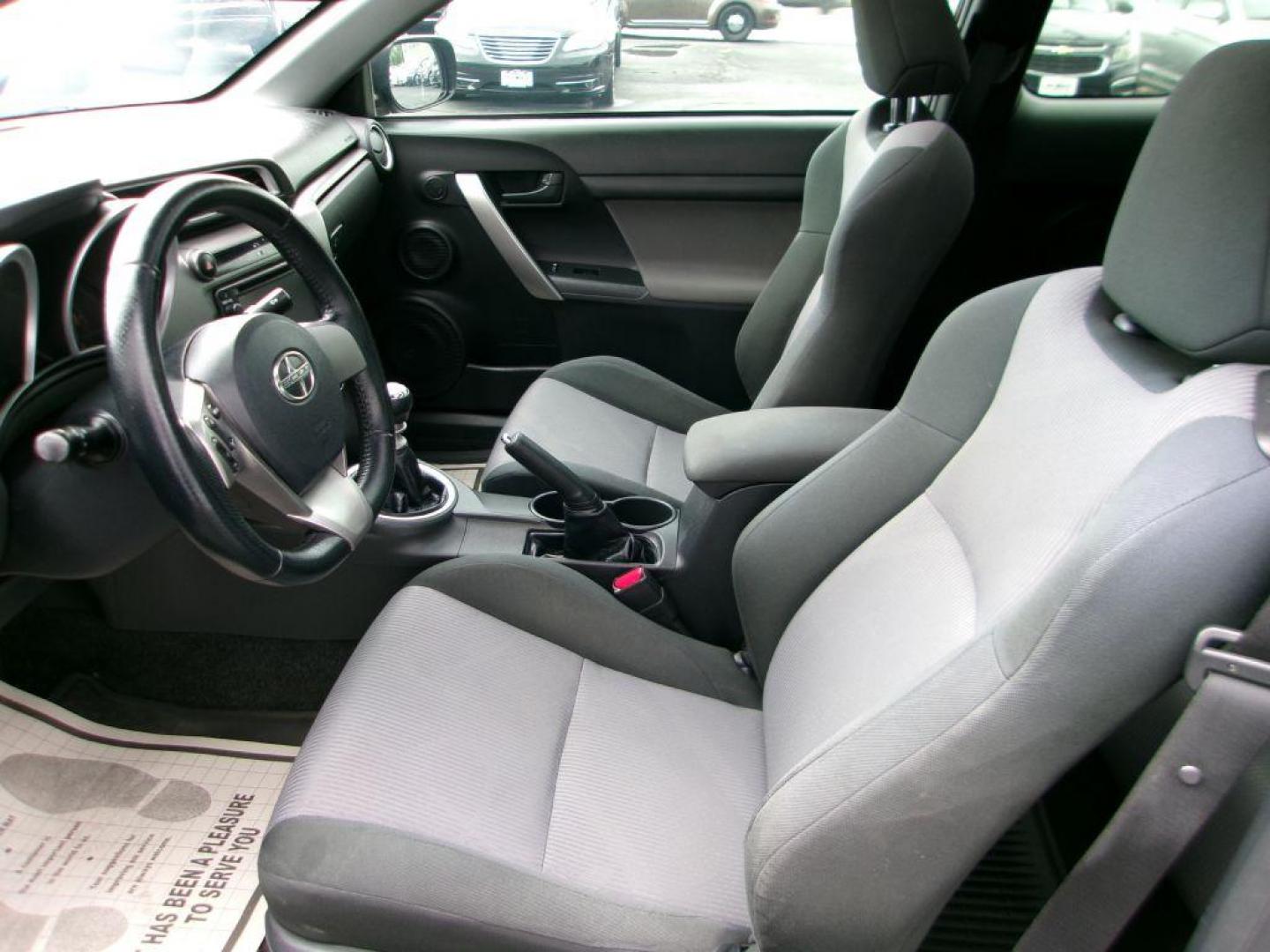 2014 BLACK SCION TC (JTKJF5C70E3) with an 2.5L engine, 6-Speed Manual transmission, located at 501 E. Columbia St., Springfield, OH, 45503, (800) 262-7122, 39.925262, -83.801796 - ***Scion TC***New Clutch***New Front and Rear Brake Pads and Rotors***Manual Transmission***SHARP***Serviced and Detailed*** Jay North Auto has offered hand picked vehicles since 1965! Our customer's enjoy a NO pressure buying experience with a small town feel. All of our vehicles get fully in - Photo#8