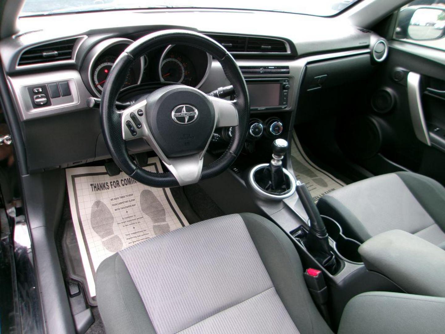 2014 BLACK SCION TC (JTKJF5C70E3) with an 2.5L engine, 6-Speed Manual transmission, located at 501 E. Columbia St., Springfield, OH, 45503, (800) 262-7122, 39.925262, -83.801796 - ***Scion TC***New Clutch***New Front and Rear Brake Pads and Rotors***Manual Transmission***SHARP***Serviced and Detailed*** Jay North Auto has offered hand picked vehicles since 1965! Our customer's enjoy a NO pressure buying experience with a small town feel. All of our vehicles get fully in - Photo#10