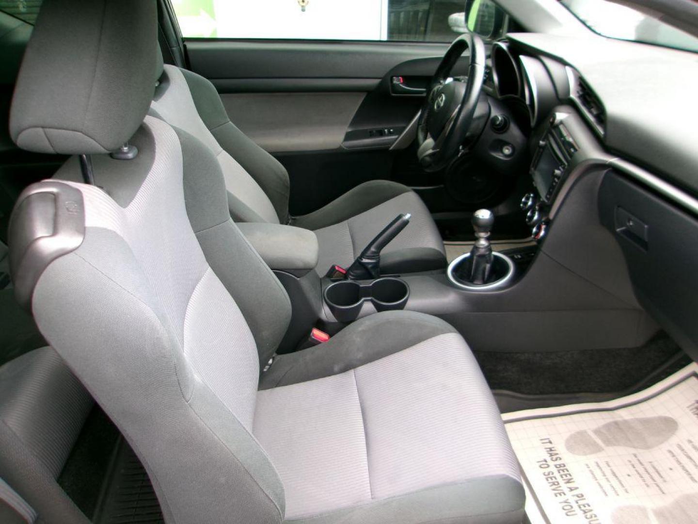 2014 BLACK SCION TC (JTKJF5C70E3) with an 2.5L engine, 6-Speed Manual transmission, located at 501 E. Columbia St., Springfield, OH, 45503, (800) 262-7122, 39.925262, -83.801796 - ***Scion TC***New Clutch***New Front and Rear Brake Pads and Rotors***Manual Transmission***SHARP***Serviced and Detailed*** Jay North Auto has offered hand picked vehicles since 1965! Our customer's enjoy a NO pressure buying experience with a small town feel. All of our vehicles get fully in - Photo#15