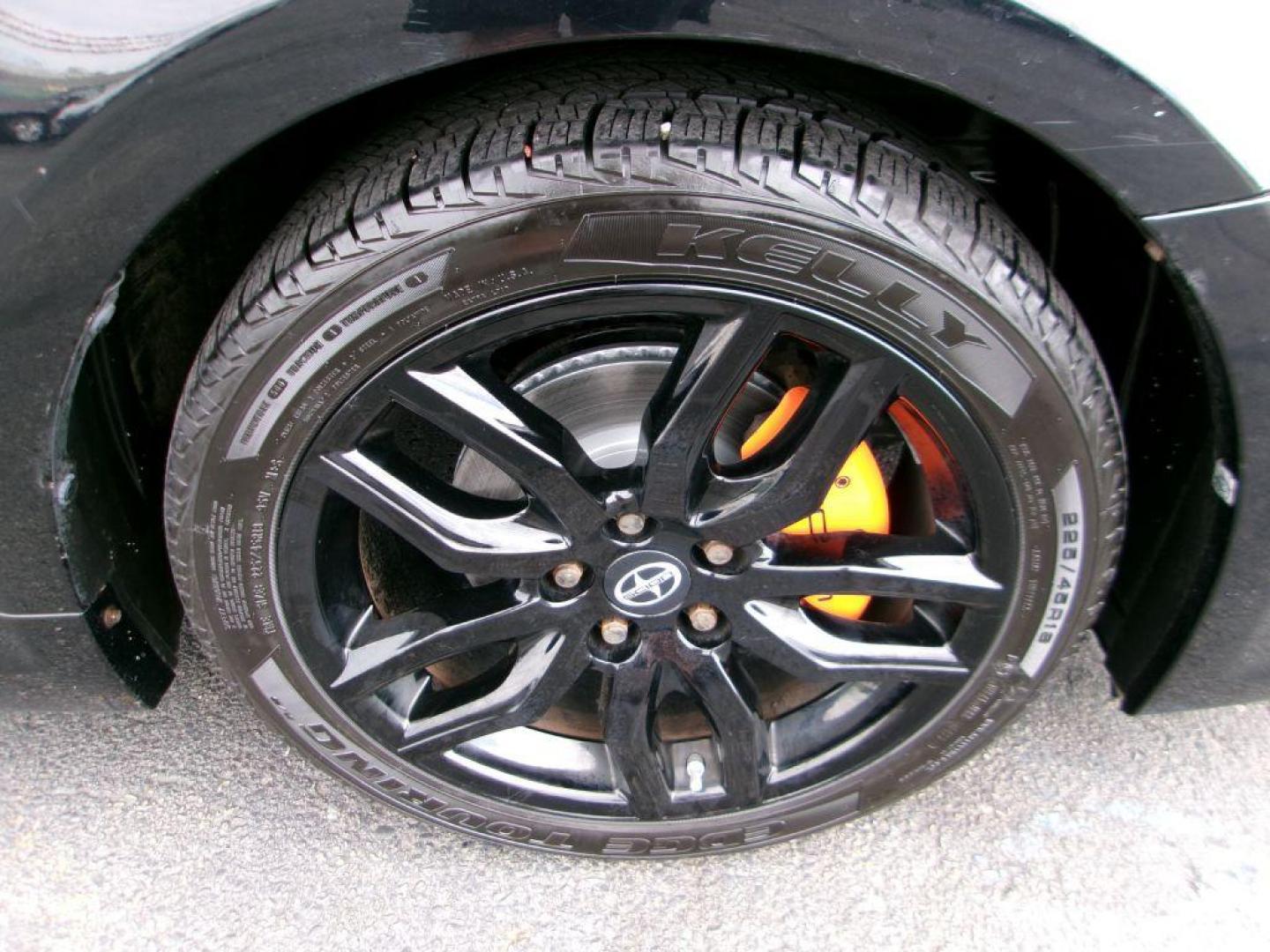 2014 BLACK SCION TC (JTKJF5C70E3) with an 2.5L engine, 6-Speed Manual transmission, located at 501 E. Columbia St., Springfield, OH, 45503, (800) 262-7122, 39.925262, -83.801796 - ***Scion TC***New Clutch***New Front and Rear Brake Pads and Rotors***Manual Transmission***SHARP***Serviced and Detailed*** Jay North Auto has offered hand picked vehicles since 1965! Our customer's enjoy a NO pressure buying experience with a small town feel. All of our vehicles get fully in - Photo#17