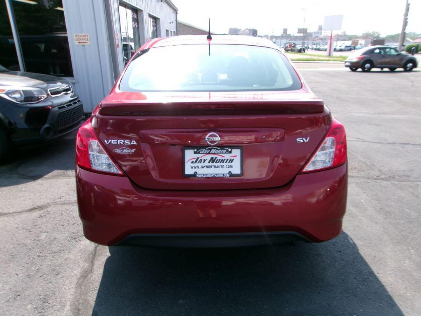 2019 RED NISSAN VERSA SV (3N1CN7AP7KL) with an 1.6L engine, Continuously Variable transmission, located at 501 E. Columbia St., Springfield, OH, 45503, (800) 262-7122, 39.925262, -83.801796 - *** SV *** Serviced and Detailed *** Back Up Camera *** Power Windows and Locks *** Jay North Auto has offered hand picked vehicles since 1965! Our customer's enjoy a NO pressure buying experience with a small town feel. All of our vehicles get fully inspected and detailed. We are a preferred de - Photo#4