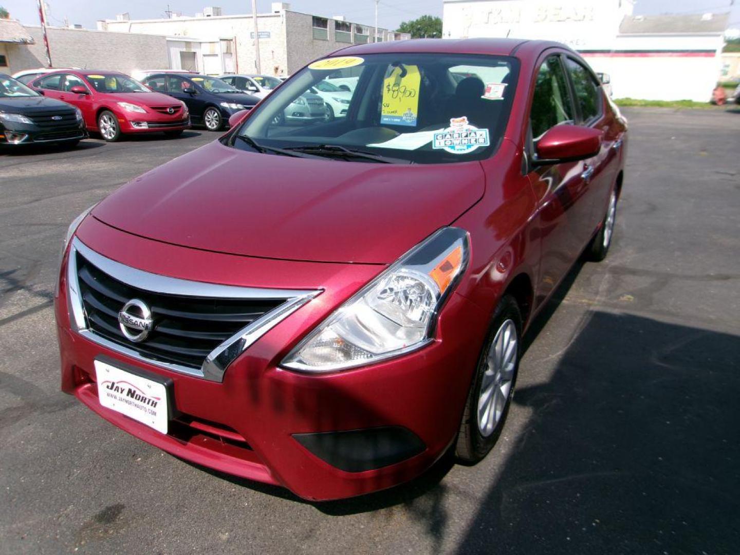 2019 RED NISSAN VERSA SV (3N1CN7AP7KL) with an 1.6L engine, Continuously Variable transmission, located at 501 E. Columbia St., Springfield, OH, 45503, (800) 262-7122, 39.925262, -83.801796 - *** SV *** Serviced and Detailed *** Back Up Camera *** Power Windows and Locks *** Jay North Auto has offered hand picked vehicles since 1965! Our customer's enjoy a NO pressure buying experience with a small town feel. All of our vehicles get fully inspected and detailed. We are a preferred de - Photo#6