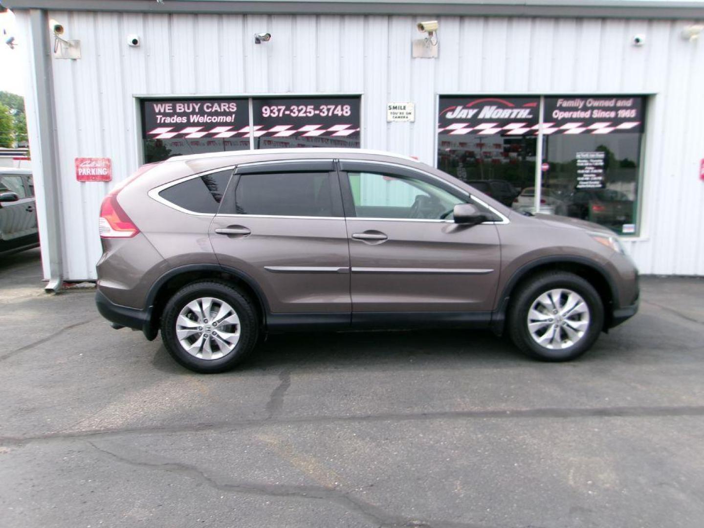 2014 BROWN HONDA CR-V EXL (2HKRM4H78EH) with an 2.4L engine, Automatic transmission, located at 501 E. Columbia St., Springfield, OH, 45503, (800) 262-7122, 39.925262, -83.801796 - Photo#1