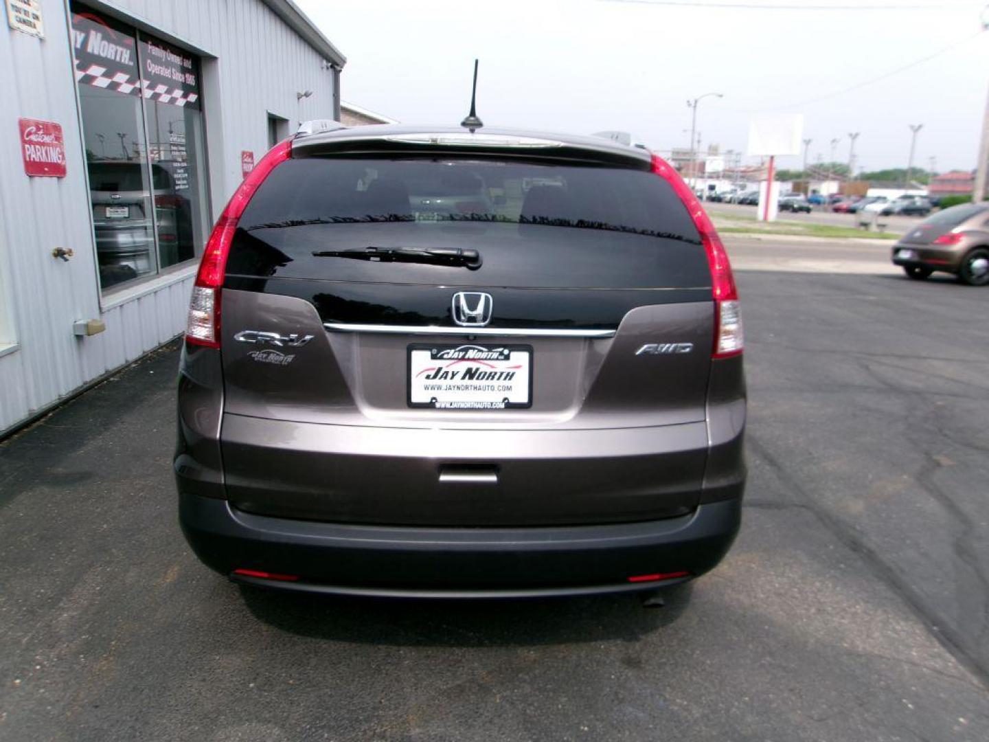 2014 BROWN HONDA CR-V EXL (2HKRM4H78EH) with an 2.4L engine, Automatic transmission, located at 501 E. Columbia St., Springfield, OH, 45503, (800) 262-7122, 39.925262, -83.801796 - Photo#4