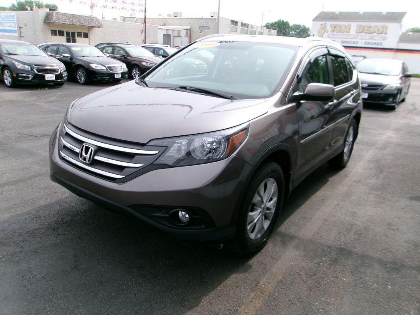 2014 BROWN HONDA CR-V EXL (2HKRM4H78EH) with an 2.4L engine, Automatic transmission, located at 501 E. Columbia St., Springfield, OH, 45503, (800) 262-7122, 39.925262, -83.801796 - Photo#6