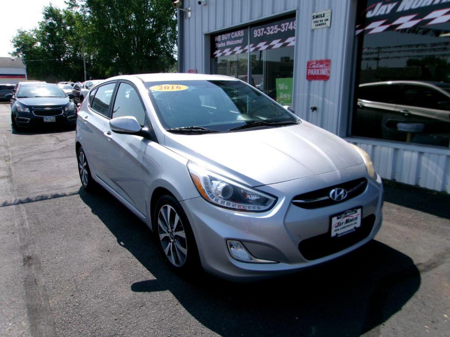 2016 SILVER HYUNDAI ACCENT SPORT (KMHCU5AE5GU) with an 1.6L engine, Automatic transmission, located at 501 E. Columbia St., Springfield, OH, 45503, (800) 262-7122, 39.925262, -83.801796 - Photo#2