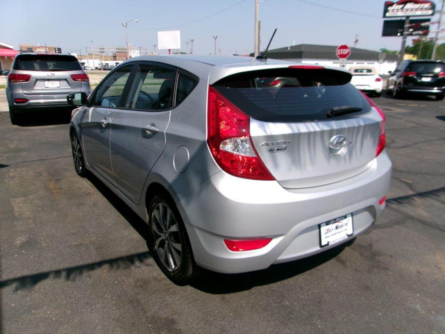 2016 SILVER HYUNDAI ACCENT SPORT (KMHCU5AE5GU) with an 1.6L engine, Automatic transmission, located at 501 E. Columbia St., Springfield, OH, 45503, (800) 262-7122, 39.925262, -83.801796 - Photo#5
