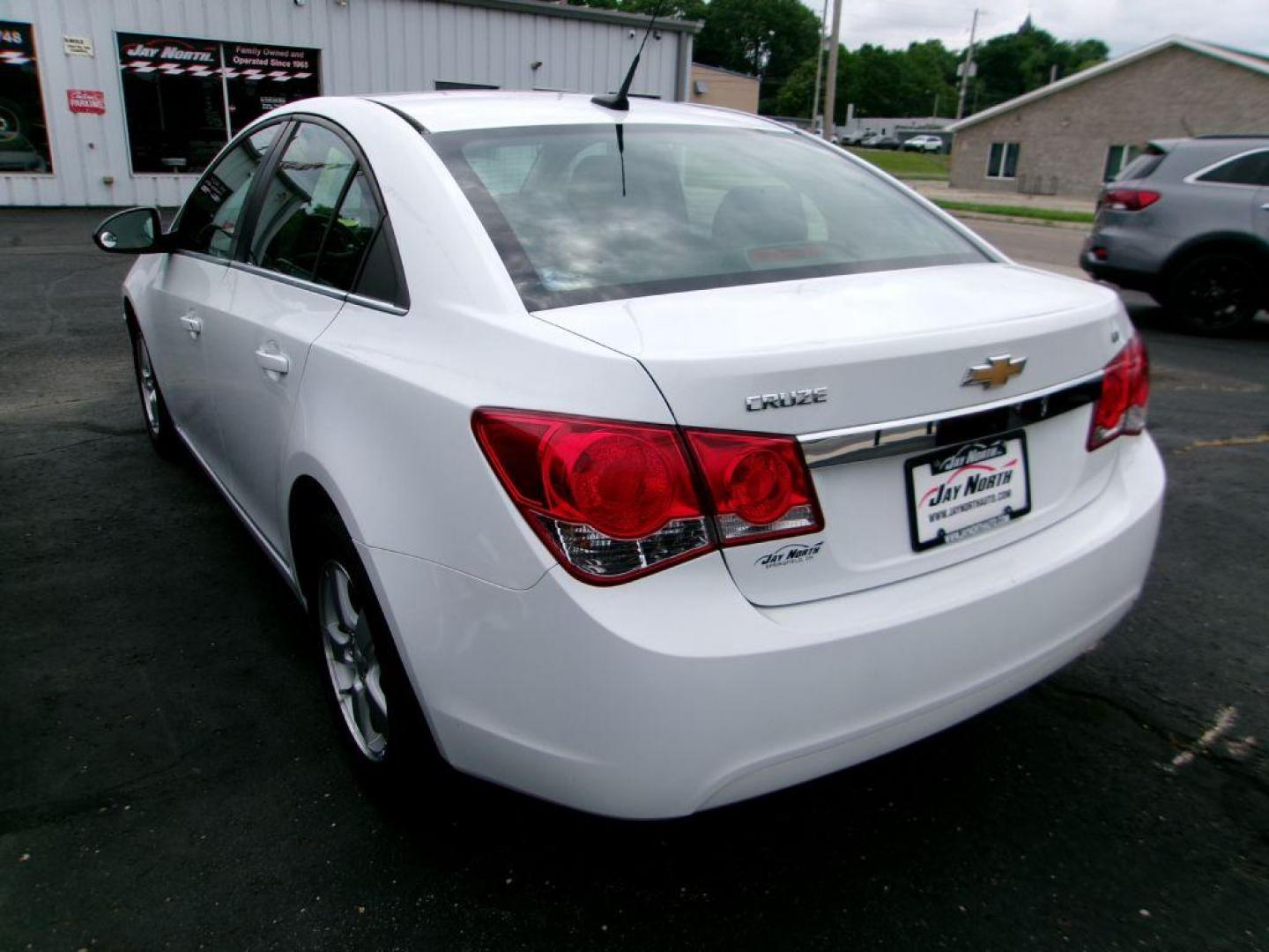 2014 WHITE CHEVROLET CRUZE LT (1G1PC5SB9E7) with an 1.4L engine, Automatic transmission, located at 501 E. Columbia St., Springfield, OH, 45503, (800) 262-7122, 39.925262, -83.801796 - *** New Tires *** New Pads and Rotors *** Serviced and Detailed *** LT *** Back Up Camera *** Remote Start *** Jay North Auto has offered hand picked vehicles since 1965! Our customer's enjoy a NO pressure buying experience with a small town feel. All of our vehicles get fully inspected and det - Photo#4