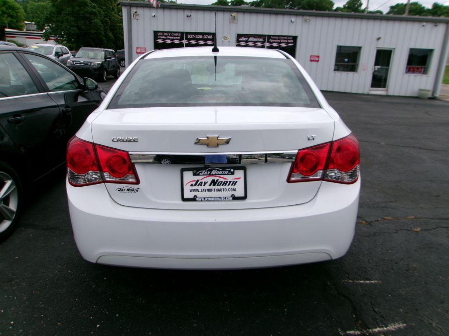 2014 WHITE CHEVROLET CRUZE LT (1G1PC5SB9E7) with an 1.4L engine, Automatic transmission, located at 501 E. Columbia St., Springfield, OH, 45503, (800) 262-7122, 39.925262, -83.801796 - *** New Tires *** New Pads and Rotors *** Serviced and Detailed *** LT *** Back Up Camera *** Remote Start *** Jay North Auto has offered hand picked vehicles since 1965! Our customer's enjoy a NO pressure buying experience with a small town feel. All of our vehicles get fully inspected and det - Photo#5