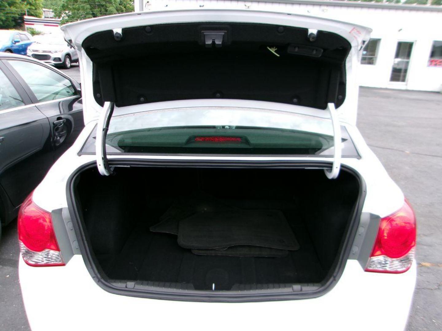 2014 WHITE CHEVROLET CRUZE LT (1G1PC5SB9E7) with an 1.4L engine, Automatic transmission, located at 501 E. Columbia St., Springfield, OH, 45503, (800) 262-7122, 39.925262, -83.801796 - *** New Tires *** New Pads and Rotors *** Serviced and Detailed *** LT *** Back Up Camera *** Remote Start *** Jay North Auto has offered hand picked vehicles since 1965! Our customer's enjoy a NO pressure buying experience with a small town feel. All of our vehicles get fully inspected and det - Photo#7