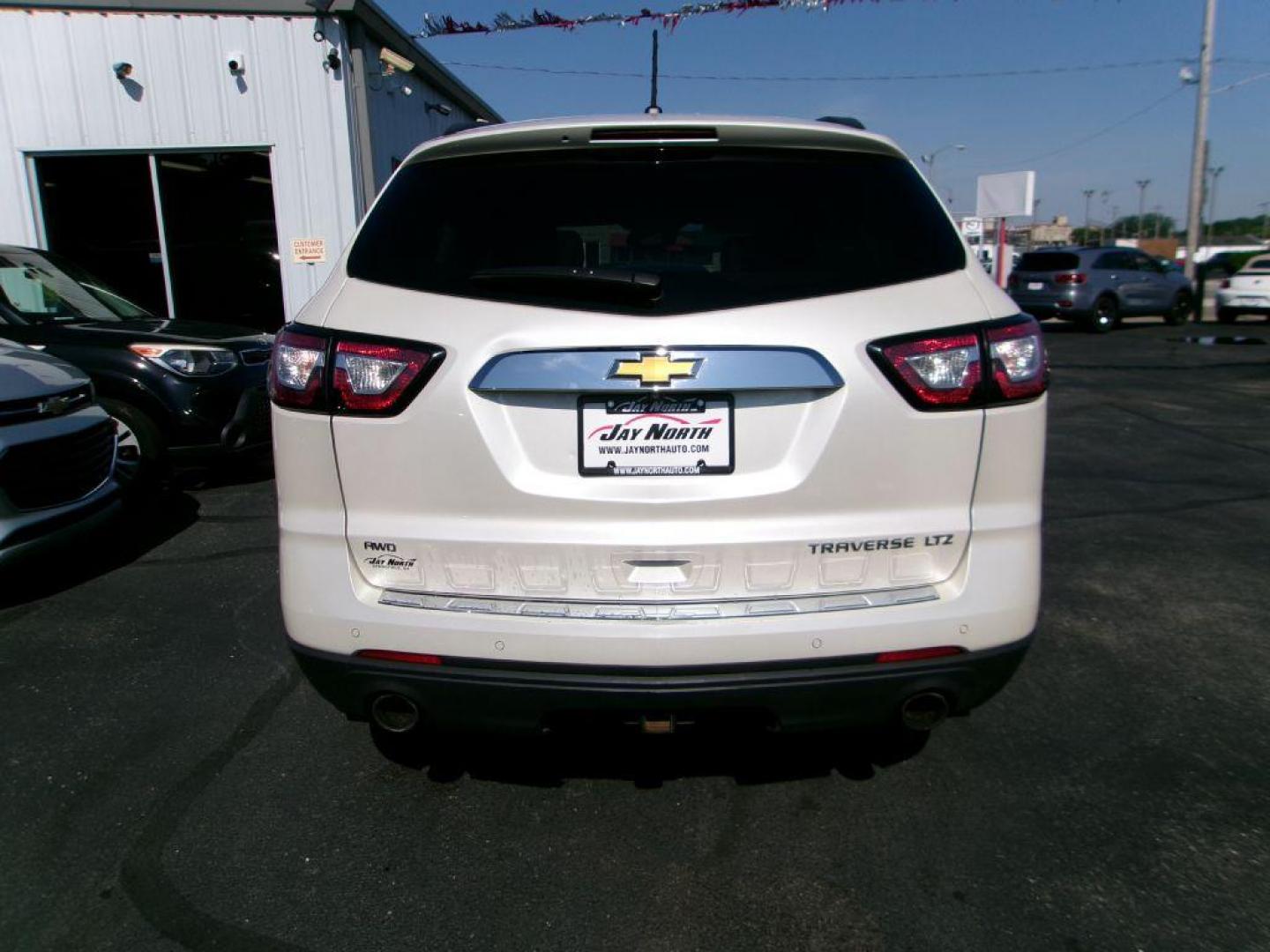 2014 WHITE CHEVROLET TRAVERSE LTZ (1GNKVJKD1EJ) with an 3.6L engine, Automatic transmission, located at 501 E. Columbia St., Springfield, OH, 45503, (800) 262-7122, 39.925262, -83.801796 - ***1-Owner***Clean Carfax***AWD***LTZ***Heated Leather Seating***3.6L V6***3rd Row Seating***Serviced and Detailed*** Jay North Auto has offered hand picked vehicles since 1965! Our customer's enjoy a NO pressure buying experience with a small town feel. All of our vehicles get fully inspected - Photo#4