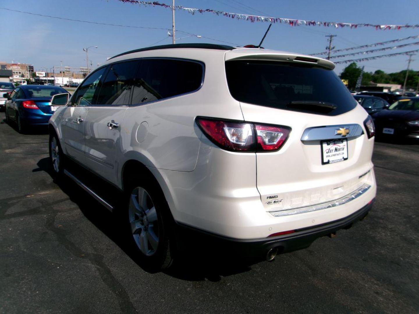 2014 WHITE CHEVROLET TRAVERSE LTZ (1GNKVJKD1EJ) with an 3.6L engine, Automatic transmission, located at 501 E. Columbia St., Springfield, OH, 45503, (800) 262-7122, 39.925262, -83.801796 - ***1-Owner***Clean Carfax***AWD***LTZ***Heated Leather Seating***3.6L V6***3rd Row Seating***Serviced and Detailed*** Jay North Auto has offered hand picked vehicles since 1965! Our customer's enjoy a NO pressure buying experience with a small town feel. All of our vehicles get fully inspected - Photo#5