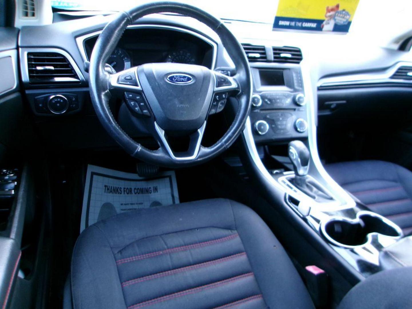 2014 RED FORD FUSION SE (3FA6P0H74ER) with an 2.5L engine, Automatic transmission, located at 501 E. Columbia St., Springfield, OH, 45503, (800) 262-7122, 39.925262, -83.801796 - *** SE Appearance Package *** Moonroof *** Serviced and Detailed *** 2.5L w/6 speed Automatic *** Jay North Auto has offered hand picked vehicles since 1965! Our customer's enjoy a NO pressure buying experience with a small town feel. All of our vehicles get fully inspected and detailed. We are - Photo#5