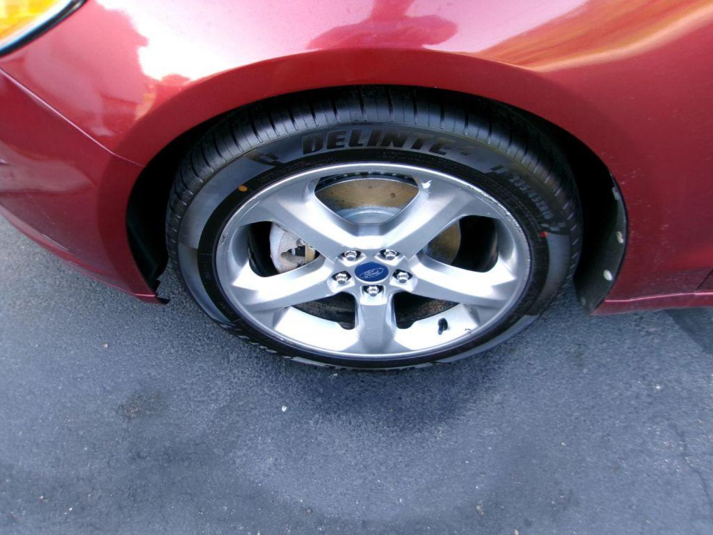 2014 RED FORD FUSION SE (3FA6P0H74ER) with an 2.5L engine, Automatic transmission, located at 501 E. Columbia St., Springfield, OH, 45503, (800) 262-7122, 39.925262, -83.801796 - *** SE Appearance Package *** Moonroof *** Serviced and Detailed *** 2.5L w/6 speed Automatic *** Jay North Auto has offered hand picked vehicles since 1965! Our customer's enjoy a NO pressure buying experience with a small town feel. All of our vehicles get fully inspected and detailed. We are - Photo#14