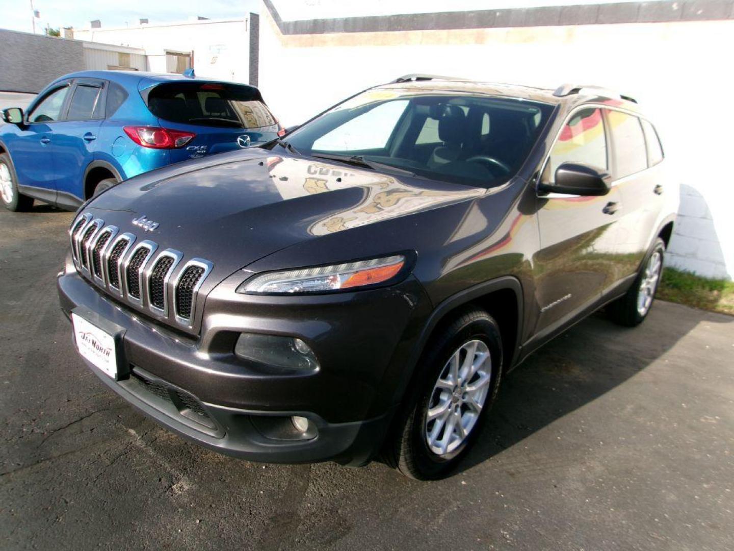 2014 GRAY JEEP CHEROKEE LATITUDE (1C4PJMCS0EW) with an 3.2L engine, Automatic transmission, located at 501 E. Columbia St., Springfield, OH, 45503, (800) 262-7122, 39.925262, -83.801796 - *** V6 4x4 *** Serviced and Detailed *** Remote Start *** Back Up Camera *** Touch Screen Audio *** Jay North Auto has offered hand picked vehicles since 1965! Our customer's enjoy a NO pressure buying experience with a small town feel. All of our vehicles get fully inspected and detailed. We a - Photo#2