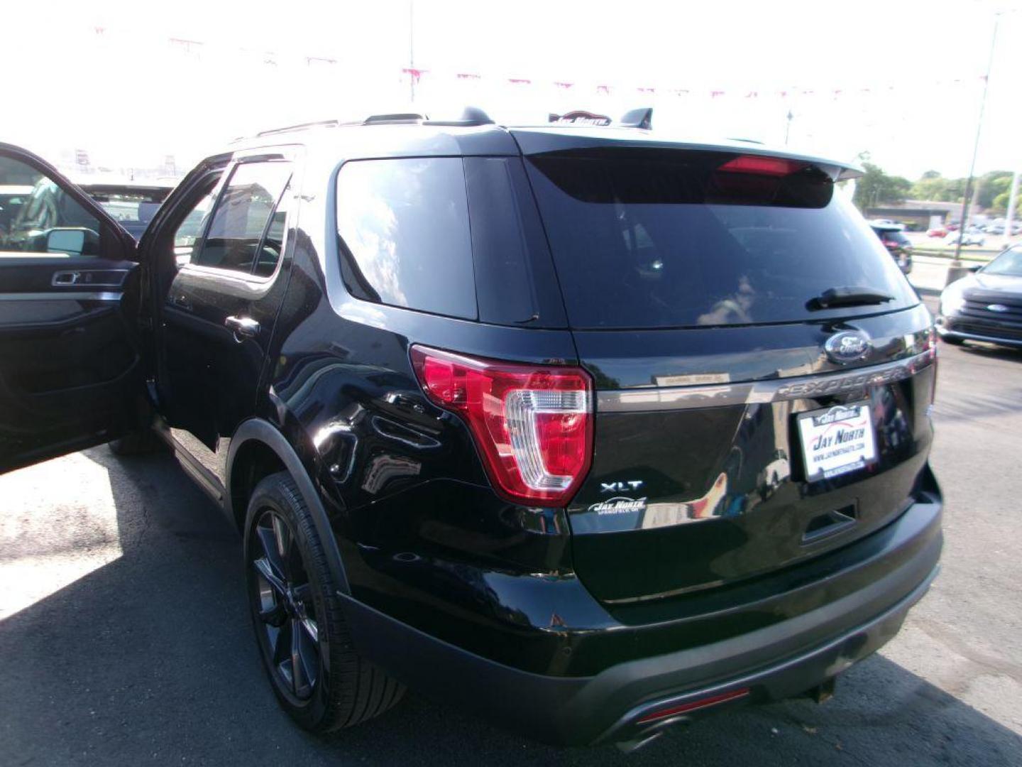 2017 BLACK FORD EXPLORER XLT (1FM5K8D82HG) with an 3.5L engine, Automatic transmission, located at 501 E. Columbia St., Springfield, OH, 45503, (800) 262-7122, 39.925262, -83.801796 - *** LOADED XLT SPORT *** 3.5L V6 *** 4wd *** Premium Audio w/9 Speakers *** Leather *** Twin Panel Moonroof *** Sport App PKG *** 20'' Magnetic Wheels *** Blind Spot *** 26 Service Records on Clean CarFax *** Jay North Auto has offered hand picked vehicles since 1965! Our customer's enjoy a NO p - Photo#3