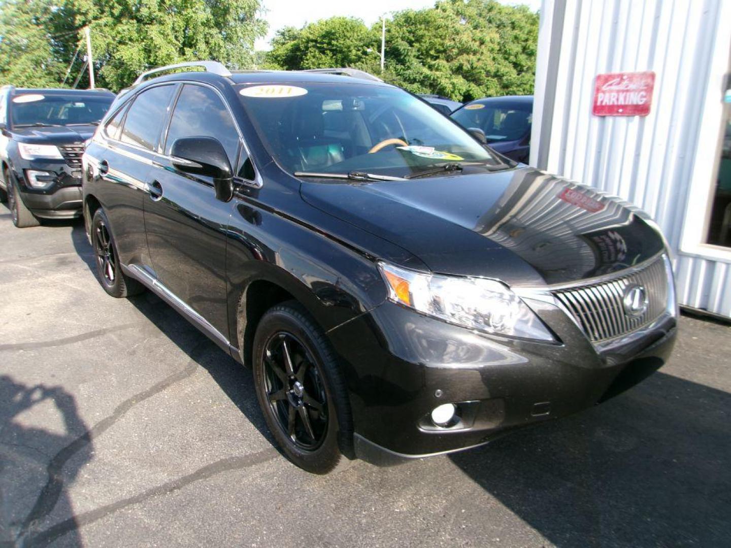 2011 BLACK LEXUS RX 350 (2T2BK1BA7BC) with an 3.5L engine, Automatic transmission, located at 501 E. Columbia St., Springfield, OH, 45503, (800) 262-7122, 39.925262, -83.801796 - *** 1 owner *** 3.5L V6 *** AWD *** Moonroof *** Premium Audio *** Heated and Cooled Seats *** Jay North Auto has offered hand picked vehicles since 1965! Our customer's enjoy a NO pressure buying experience with a small town feel. All of our vehicles get fully inspected and detailed. We are a - Photo#0