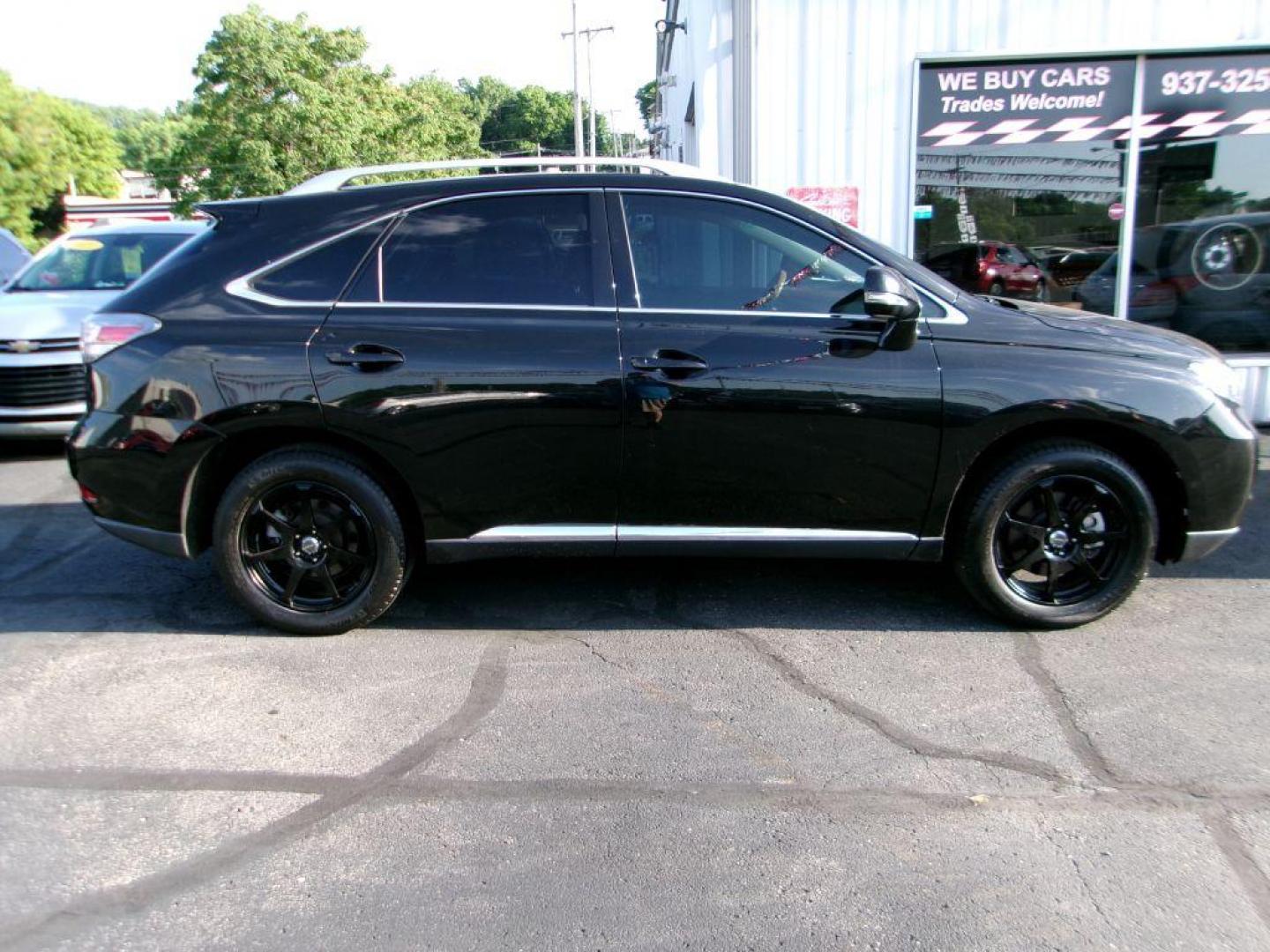 2011 BLACK LEXUS RX 350 (2T2BK1BA7BC) with an 3.5L engine, Automatic transmission, located at 501 E. Columbia St., Springfield, OH, 45503, (800) 262-7122, 39.925262, -83.801796 - *** 1 owner *** 3.5L V6 *** AWD *** Moonroof *** Premium Audio *** Heated and Cooled Seats *** Jay North Auto has offered hand picked vehicles since 1965! Our customer's enjoy a NO pressure buying experience with a small town feel. All of our vehicles get fully inspected and detailed. We are a - Photo#1