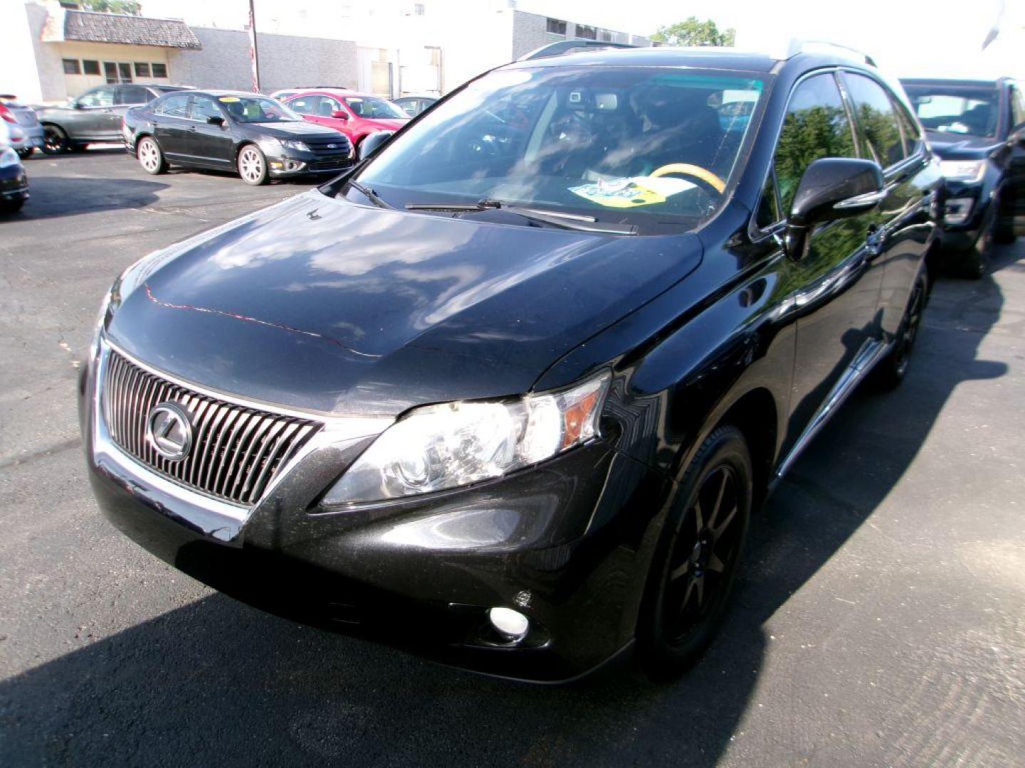 2011 BLACK LEXUS RX 350 (2T2BK1BA7BC) with an 3.5L engine, Automatic transmission, located at 501 E. Columbia St., Springfield, OH, 45503, (800) 262-7122, 39.925262, -83.801796 - *** 1 owner *** 3.5L V6 *** AWD *** Moonroof *** Premium Audio *** Heated and Cooled Seats *** Jay North Auto has offered hand picked vehicles since 1965! Our customer's enjoy a NO pressure buying experience with a small town feel. All of our vehicles get fully inspected and detailed. We are a - Photo#3