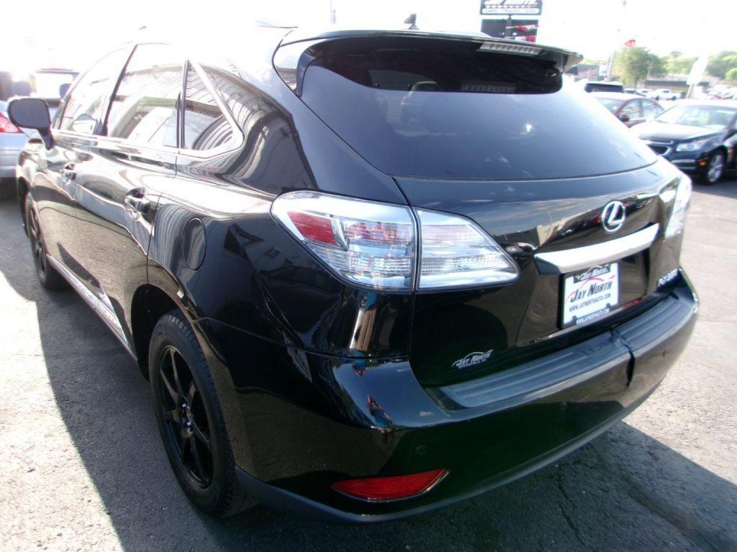 2011 BLACK LEXUS RX 350 (2T2BK1BA7BC) with an 3.5L engine, Automatic transmission, located at 501 E. Columbia St., Springfield, OH, 45503, (800) 262-7122, 39.925262, -83.801796 - *** 1 owner *** 3.5L V6 *** AWD *** Moonroof *** Premium Audio *** Heated and Cooled Seats *** Jay North Auto has offered hand picked vehicles since 1965! Our customer's enjoy a NO pressure buying experience with a small town feel. All of our vehicles get fully inspected and detailed. We are a - Photo#4