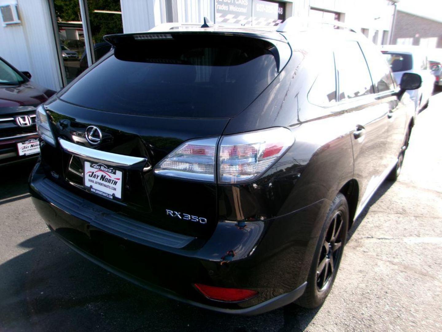 2011 BLACK LEXUS RX 350 (2T2BK1BA7BC) with an 3.5L engine, Automatic transmission, located at 501 E. Columbia St., Springfield, OH, 45503, (800) 262-7122, 39.925262, -83.801796 - *** 1 owner *** 3.5L V6 *** AWD *** Moonroof *** Premium Audio *** Heated and Cooled Seats *** Jay North Auto has offered hand picked vehicles since 1965! Our customer's enjoy a NO pressure buying experience with a small town feel. All of our vehicles get fully inspected and detailed. We are a - Photo#5