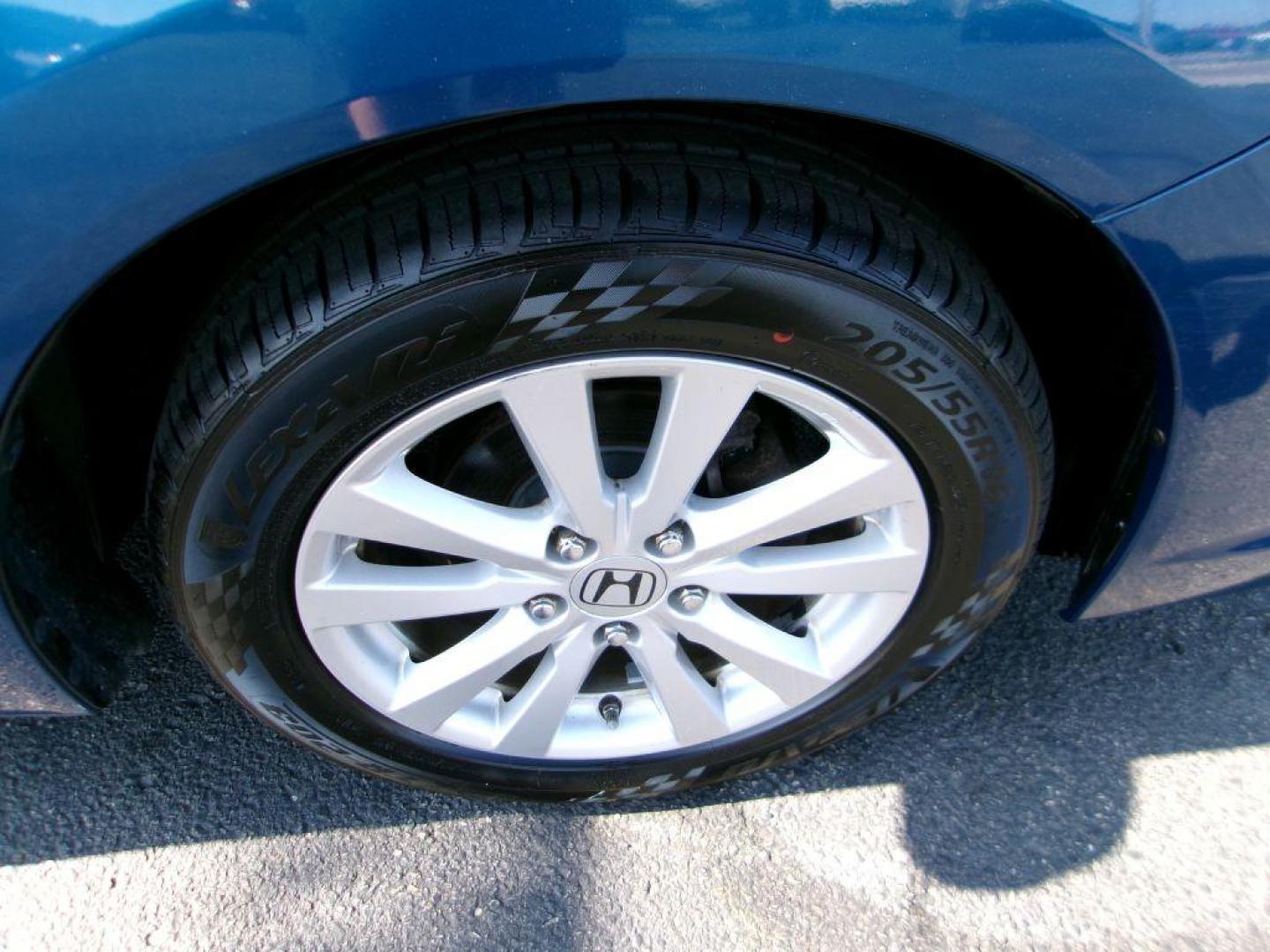 2012 BLUE HONDA CIVIC EX (2HGFG3B88CH) with an 1.8L engine, Automatic transmission, located at 501 E. Columbia St., Springfield, OH, 45503, (800) 262-7122, 39.925262, -83.801796 - ***1-Owner***New Tires***New Rear Brake Pads and Rotors***Sunroof***EX***Serviced and Detailed*** Jay North Auto has offered hand picked vehicles since 1965! Our customer's enjoy a NO pressure buying experience with a small town feel. All of our vehicles get fully inspected and detailed. We are - Photo#16