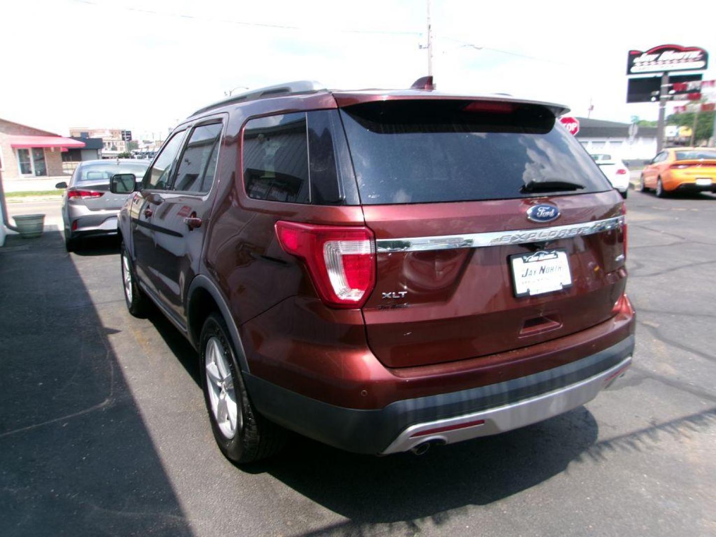 2016 BRONZE FORD EXPLORER XLT (1FM5K8D86GG) with an 3.5L engine, Automatic transmission, located at 501 E. Columbia St., Springfield, OH, 45503, (800) 262-7122, 39.925262, -83.801796 - ***Clean Carfax***XLT***3rd Row Seating***Heated Leather Seating***New Tires***New Rear Brake Pads and Rotors***Serviced and Detailed*** Jay North Auto has offered hand picked vehicles since 1965! Our customer's enjoy a NO pressure buying experience with a small town feel. All of our vehicles - Photo#5