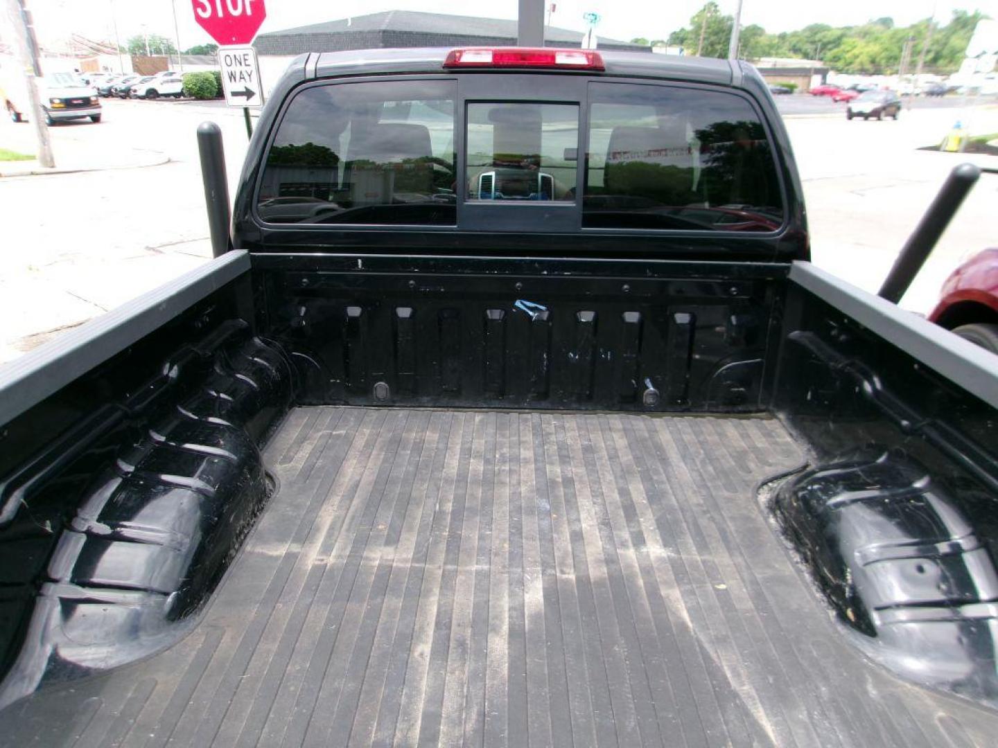 2015 BLACK NISSAN FRONTIER SV (1N6BD0CTXFN) with an 2.5L engine, Automatic transmission, located at 501 E. Columbia St., Springfield, OH, 45503, (800) 262-7122, 39.925262, -83.801796 - *** SV *** New Brakes *** Serviced and Detailed * SuperCab *** Automatic *** Clean CarFax *** 2 Owner *** NICE!!!! *** Jay North Auto has offered hand picked vehicles since 1965! Our customer's enjoy a NO pressure buying experience with a small town feel. All of our vehicles get fully inspected - Photo#5