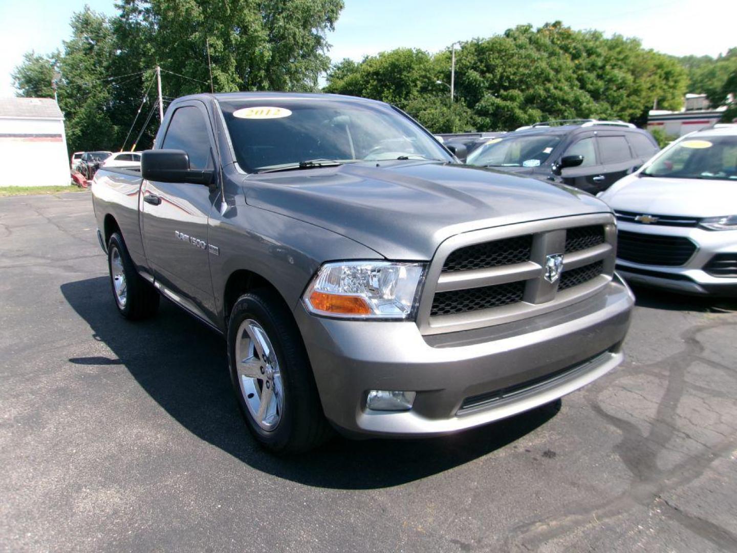 2012 GRAY DODGE RAM 1500 EXPRESS (3C6JD6AT3CG) with an 5.7L engine, Automatic transmission, located at 501 E. Columbia St., Springfield, OH, 45503, (800) 262-7122, 39.925262, -83.801796 - ***1-Owner***New Front Brake Pads and Rotors***Express***5.7L Hemi***Serviced and Detailed*** Jay North Auto has offered hand picked vehicles since 1965! Our customer's enjoy a NO pressure buying experience with a small town feel. All of our vehicles get fully inspected and detailed. We are a - Photo#0