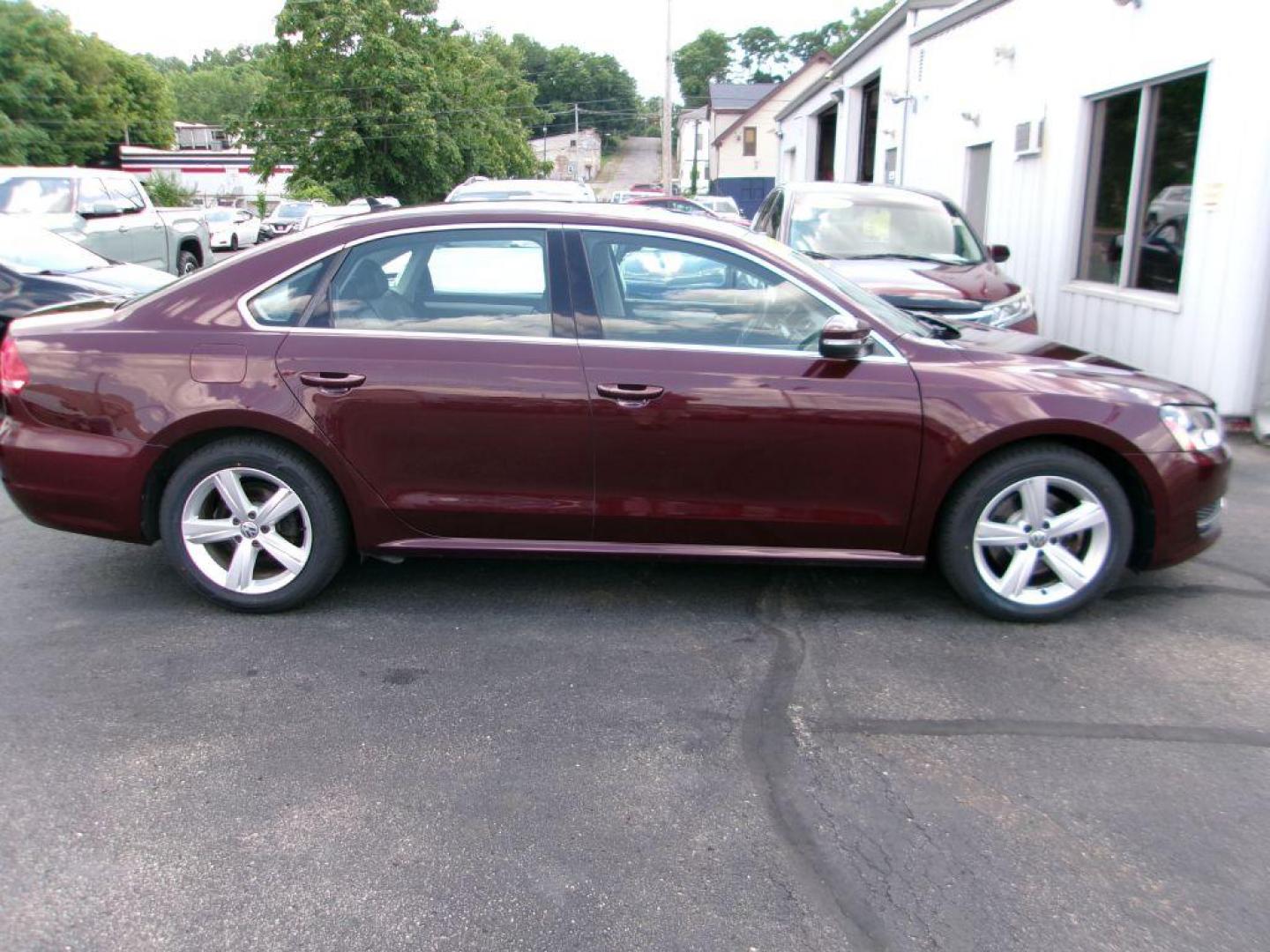 2013 RED VOLKSWAGEN PASSAT SE (1VWBP7A31DC) with an 2.5L engine, Automatic transmission, located at 501 E. Columbia St., Springfield, OH, 45503, (800) 262-7122, 39.925262, -83.801796 - *** New Tires *** New Brakes *** Serviced and Detailed *** 2.5L *** Jay North Auto has offered hand picked vehicles since 1965! Our customer's enjoy a NO pressure buying experience with a small town feel. All of our vehicles get fully inspected and detailed. We are a preferred dealer for many l - Photo#1