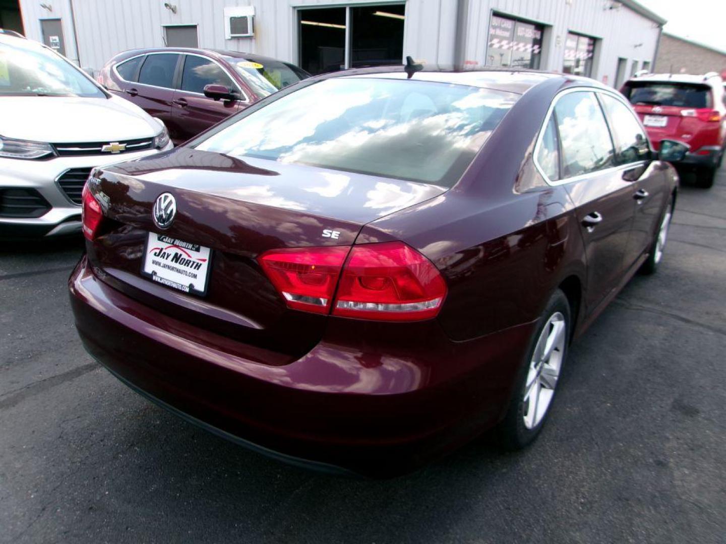 2013 RED VOLKSWAGEN PASSAT SE (1VWBP7A31DC) with an 2.5L engine, Automatic transmission, located at 501 E. Columbia St., Springfield, OH, 45503, (800) 262-7122, 39.925262, -83.801796 - *** New Tires *** New Brakes *** Serviced and Detailed *** 2.5L *** Jay North Auto has offered hand picked vehicles since 1965! Our customer's enjoy a NO pressure buying experience with a small town feel. All of our vehicles get fully inspected and detailed. We are a preferred dealer for many l - Photo#5