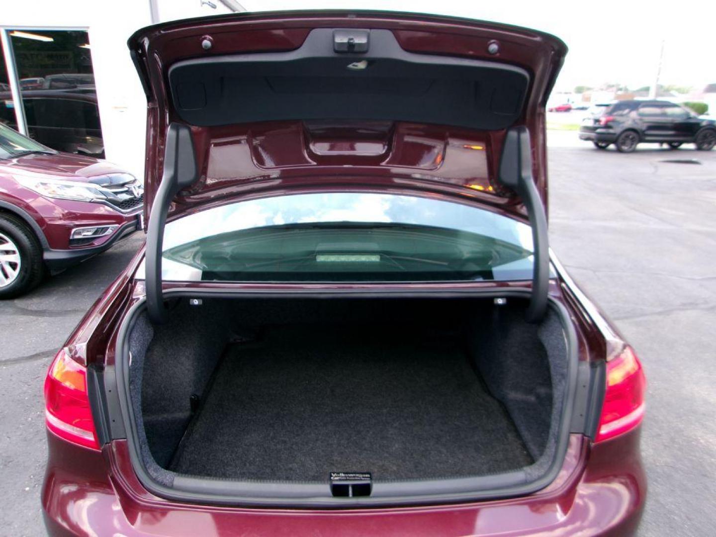 2013 RED VOLKSWAGEN PASSAT SE (1VWBP7A31DC) with an 2.5L engine, Automatic transmission, located at 501 E. Columbia St., Springfield, OH, 45503, (800) 262-7122, 39.925262, -83.801796 - *** New Tires *** New Brakes *** Serviced and Detailed *** 2.5L *** Jay North Auto has offered hand picked vehicles since 1965! Our customer's enjoy a NO pressure buying experience with a small town feel. All of our vehicles get fully inspected and detailed. We are a preferred dealer for many l - Photo#6