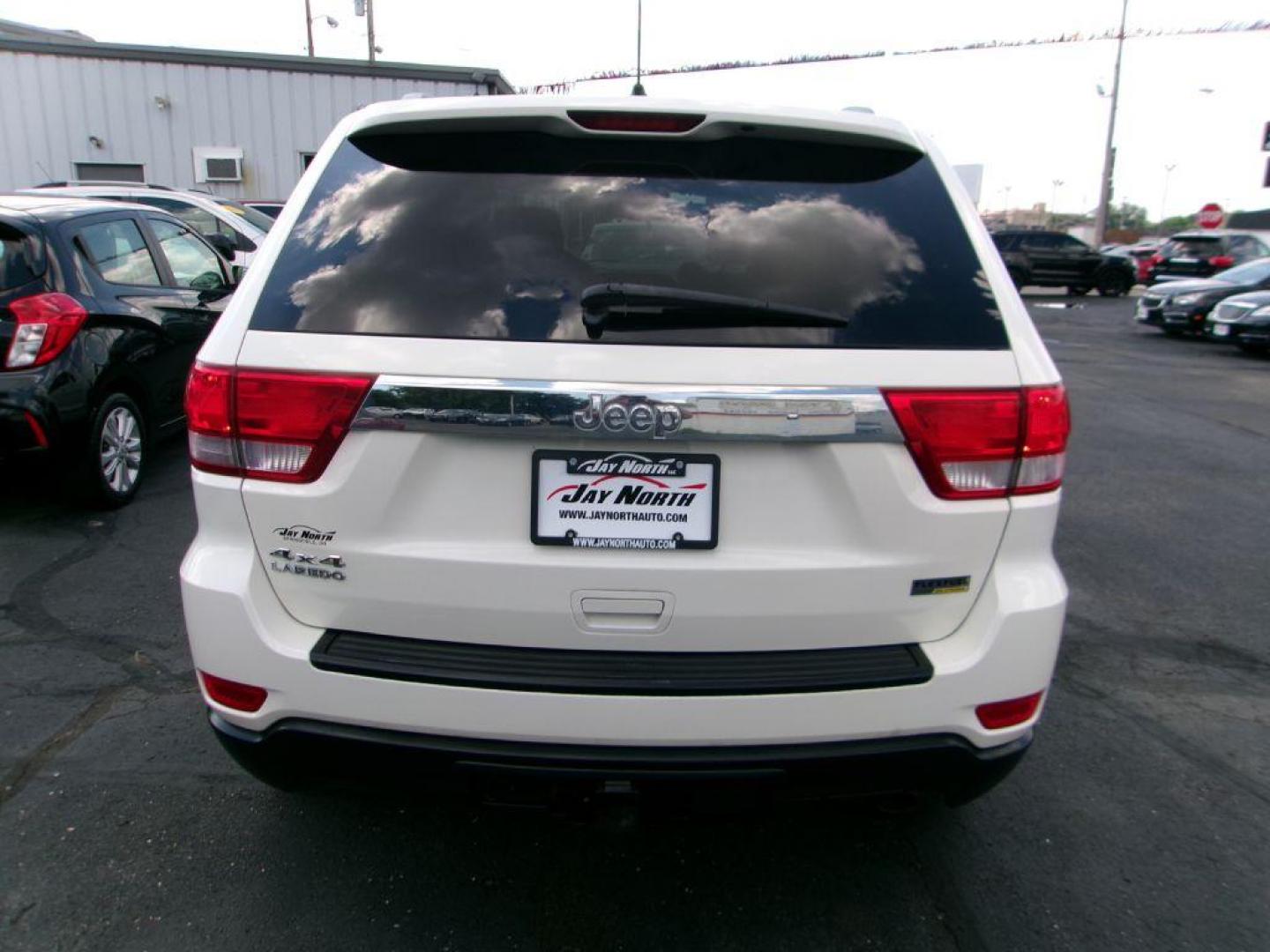 2011 WHITE JEEP GRAND CHEROKEE LAREDO (1J4RR4GG5BC) with an 3.6L engine, Automatic transmission, located at 501 E. Columbia St., Springfield, OH, 45503, (800) 262-7122, 39.925262, -83.801796 - *** 1 Owner *** 19 Service Records on Clean CarFax *** New Battery New Rear Brakes *** Serviced and Detailed *** Jay North Auto has offered hand picked vehicles since 1965! Our customer's enjoy a NO pressure buying experience with a small town feel. All of our vehicles get fully inspected and d - Photo#3
