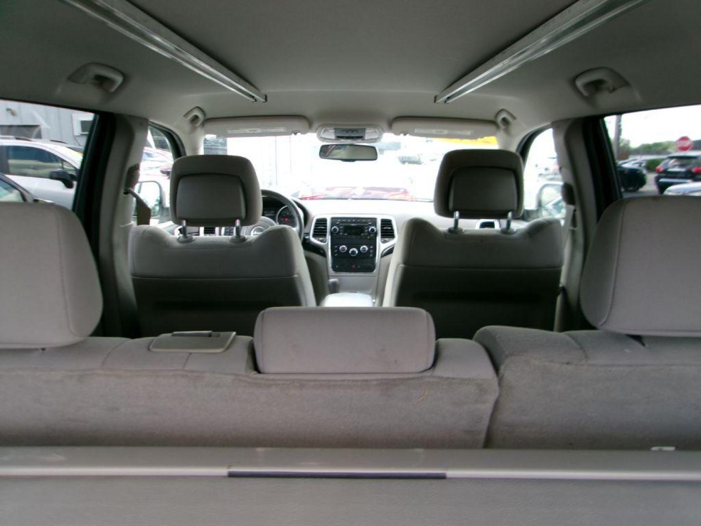 2011 WHITE JEEP GRAND CHEROKEE LAREDO (1J4RR4GG5BC) with an 3.6L engine, Automatic transmission, located at 501 E. Columbia St., Springfield, OH, 45503, (800) 262-7122, 39.925262, -83.801796 - *** 1 Owner *** 19 Service Records on Clean CarFax *** New Battery New Rear Brakes *** Serviced and Detailed *** Jay North Auto has offered hand picked vehicles since 1965! Our customer's enjoy a NO pressure buying experience with a small town feel. All of our vehicles get fully inspected and d - Photo#6
