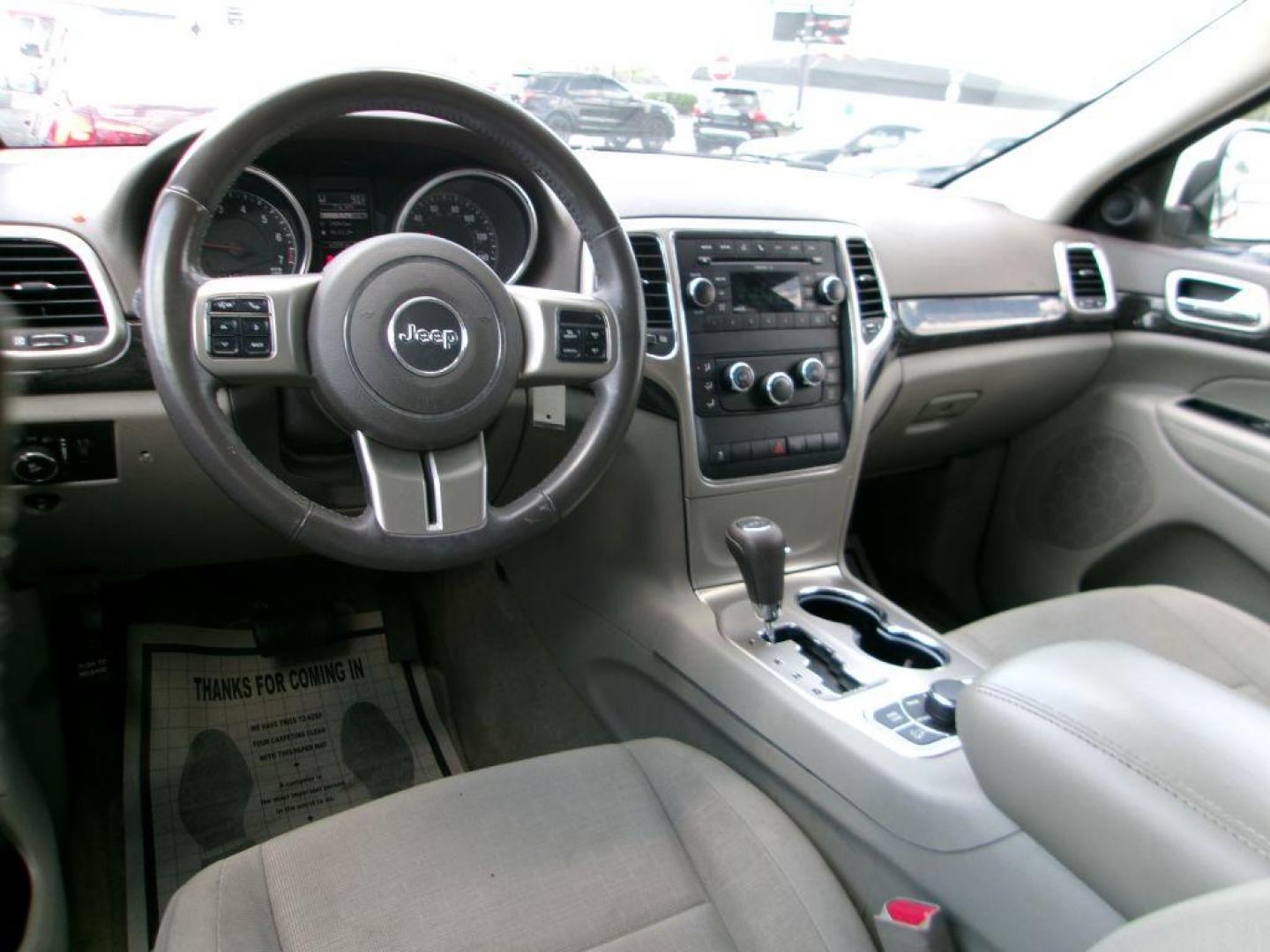 2011 WHITE JEEP GRAND CHEROKEE LAREDO (1J4RR4GG5BC) with an 3.6L engine, Automatic transmission, located at 501 E. Columbia St., Springfield, OH, 45503, (800) 262-7122, 39.925262, -83.801796 - *** 1 Owner *** 19 Service Records on Clean CarFax *** New Battery New Rear Brakes *** Serviced and Detailed *** Jay North Auto has offered hand picked vehicles since 1965! Our customer's enjoy a NO pressure buying experience with a small town feel. All of our vehicles get fully inspected and d - Photo#8