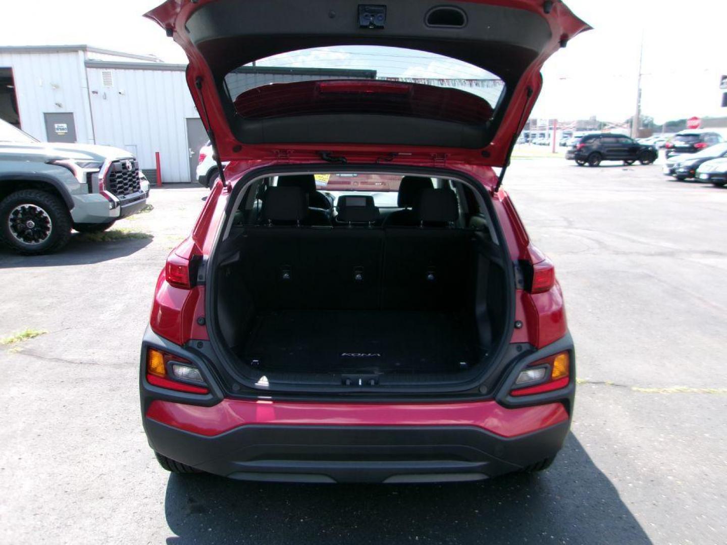 2019 RED HYUNDAI KONA SEL (KM8K62AA5KU) with an 2.0L engine, Automatic transmission, located at 501 E. Columbia St., Springfield, OH, 45503, (800) 262-7122, 39.925262, -83.801796 - *** New Tires *** 1 Owner w/ Clean Car Fax and 21 Service Records *** Moonroof *** Infinity Audio *** New Brakes *** Serviced and Detailed *** 17'' Alloy Wheels and 215/55R17 Tires Automatic On/Off Headlights; LED Daytime Running Lights Bodycolor Rear Spoiler w/ Brake Light; Roof Side Ra - Photo#7
