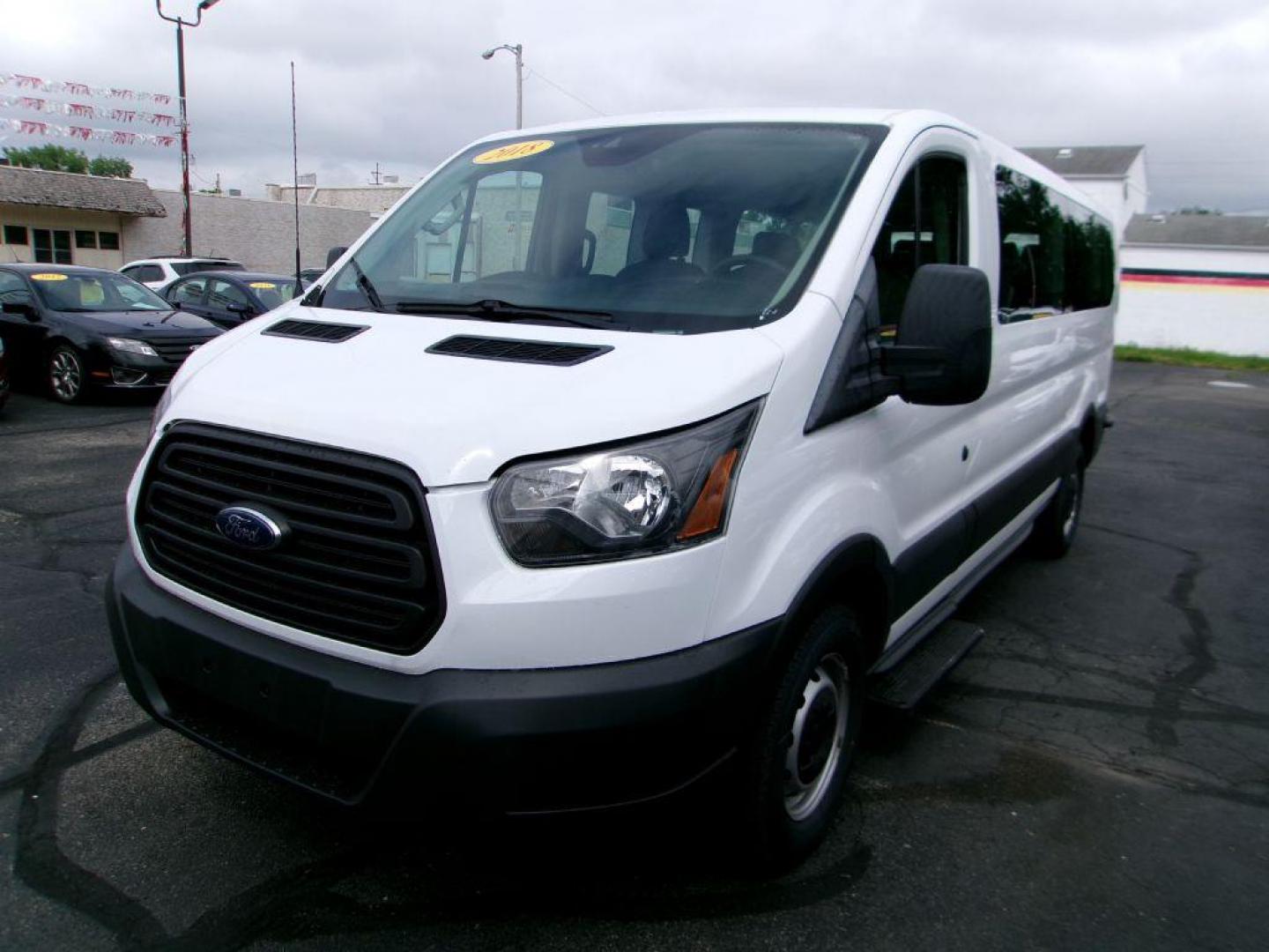 2018 WHITE FORD TRANSIT T-350 (1FBZX2ZM8JK) with an 3.7L engine, Automatic transmission, located at 501 E. Columbia St., Springfield, OH, 45503, (800) 262-7122, 39.925262, -83.801796 - *** New Tires *** 1 Owner *** Serviced and Detailed *** 15 Passenger *** 3.7L *** Low Miles *** Jay North Auto has offered hand picked vehicles since 1965! Our customer's enjoy a NO pressure buying experience with a small town feel. All of our vehicles get fully inspected and detailed. We are a - Photo#3