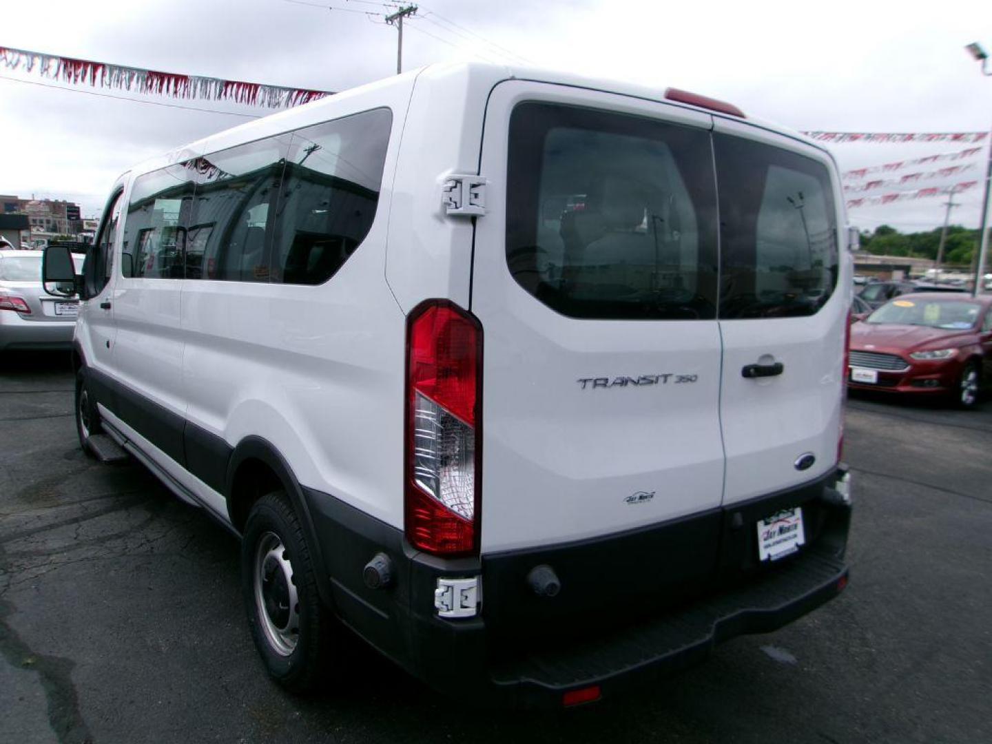 2018 WHITE FORD TRANSIT T-350 (1FBZX2ZM8JK) with an 3.7L engine, Automatic transmission, located at 501 E. Columbia St., Springfield, OH, 45503, (800) 262-7122, 39.925262, -83.801796 - *** New Tires *** 1 Owner *** Serviced and Detailed *** 15 Passenger *** 3.7L *** Low Miles *** Jay North Auto has offered hand picked vehicles since 1965! Our customer's enjoy a NO pressure buying experience with a small town feel. All of our vehicles get fully inspected and detailed. We are a - Photo#4
