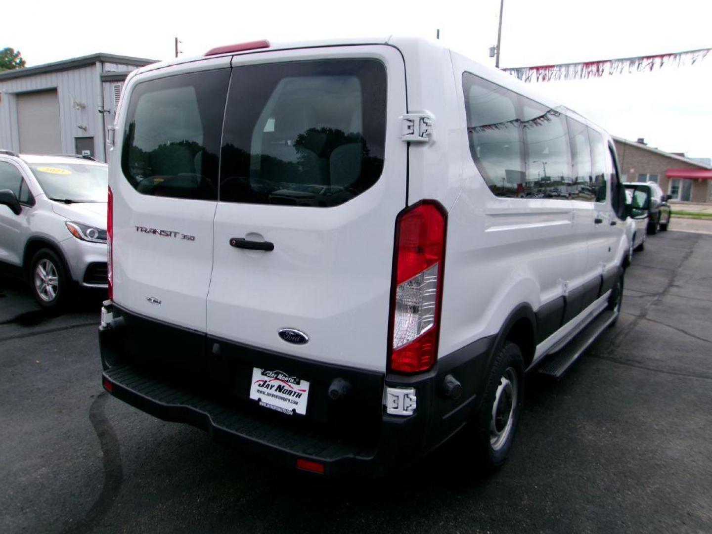 2018 WHITE FORD TRANSIT T-350 (1FBZX2ZM8JK) with an 3.7L engine, Automatic transmission, located at 501 E. Columbia St., Springfield, OH, 45503, (800) 262-7122, 39.925262, -83.801796 - *** New Tires *** 1 Owner *** Serviced and Detailed *** 15 Passenger *** 3.7L *** Low Miles *** Jay North Auto has offered hand picked vehicles since 1965! Our customer's enjoy a NO pressure buying experience with a small town feel. All of our vehicles get fully inspected and detailed. We are a - Photo#6
