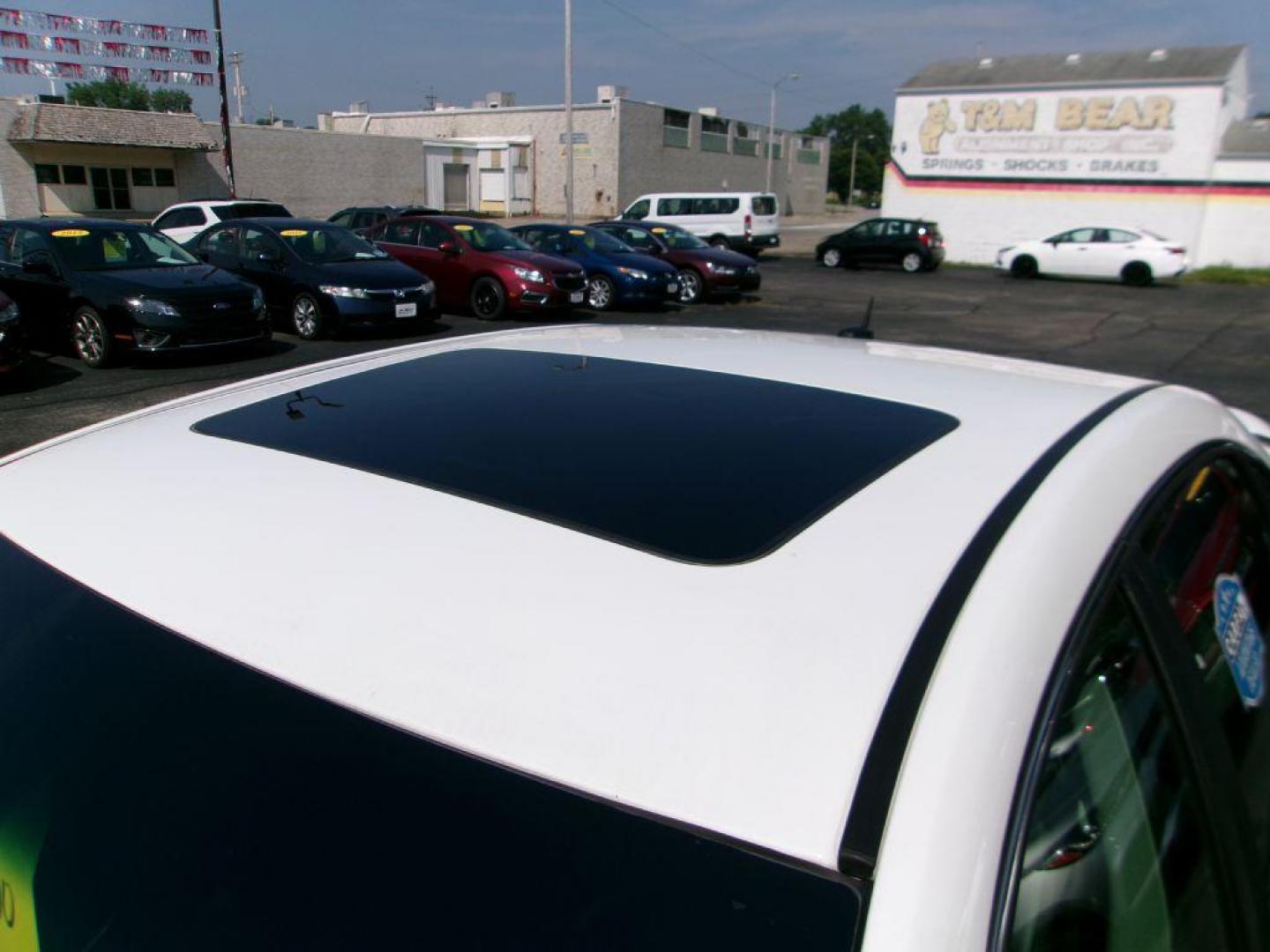 2015 WHITE CHEVROLET IMPALA LIMITED LTZ (2G1WC5E32F1) with an 3.6L engine, Automatic transmission, located at 501 E. Columbia St., Springfield, OH, 45503, (800) 262-7122, 39.925262, -83.801796 - *** LTZ *** Leather *** Bose Audio *** Moonroof *** Remote Start *** Clean CarFax w/ great Service History *** NICE *** Serviced and Detailed *** Jay North Auto has offered hand picked vehicles since 1965! Our customer's enjoy a NO pressure buying experience with a small town feel. All of our v - Photo#4