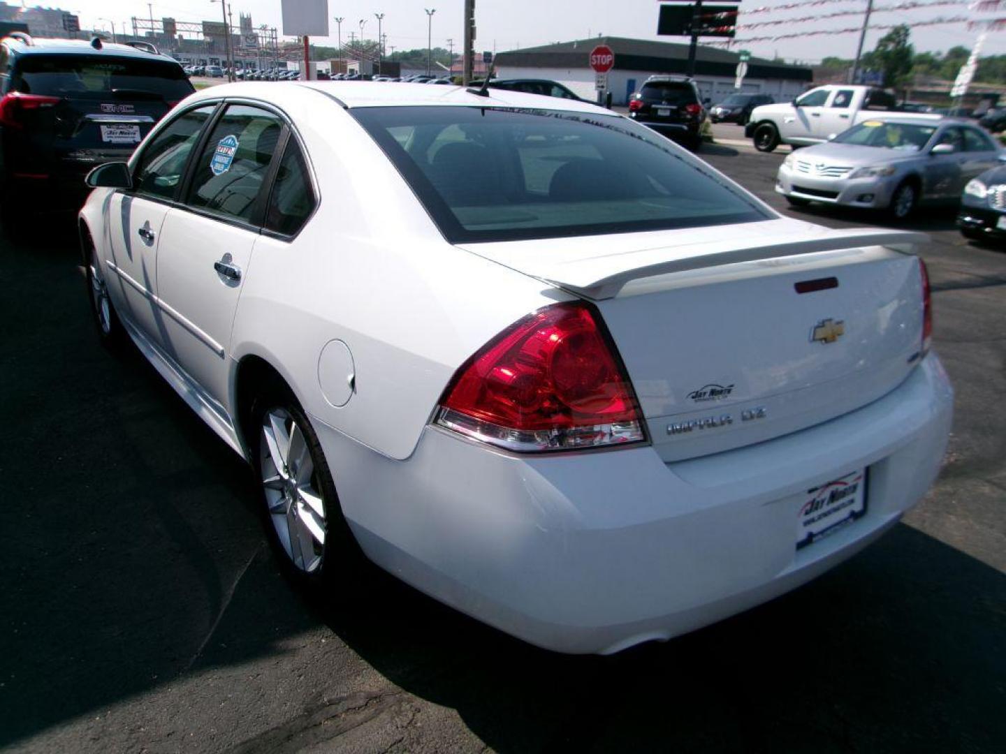 2015 WHITE CHEVROLET IMPALA LIMITED LTZ (2G1WC5E32F1) with an 3.6L engine, Automatic transmission, located at 501 E. Columbia St., Springfield, OH, 45503, (800) 262-7122, 39.925262, -83.801796 - *** LTZ *** Leather *** Bose Audio *** Moonroof *** Remote Start *** Clean CarFax w/ great Service History *** NICE *** Serviced and Detailed *** Jay North Auto has offered hand picked vehicles since 1965! Our customer's enjoy a NO pressure buying experience with a small town feel. All of our v - Photo#5