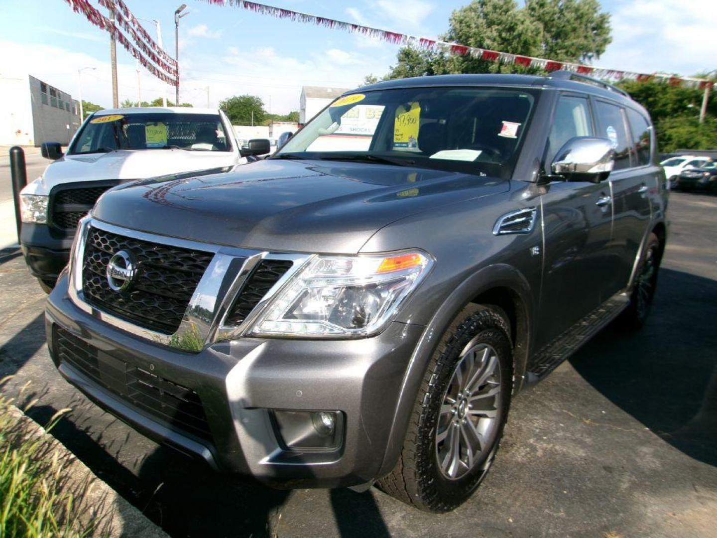 2019 GRAY NISSAN ARMADA SL (JN8AY2NC1K9) with an 5.6L engine, Automatic transmission, located at 501 E. Columbia St., Springfield, OH, 45503, (800) 262-7122, 39.925262, -83.801796 - *** 5.6L V8 *** Premium Package *** Moonroof *** Bose Audio *** Navigation *** 3rd Row Seating *** Clean CarFax w/ 16 Service Records *** Jay North Auto has offered hand picked vehicles since 1965! Our customer's enjoy a NO pressure buying experience with a small town feel. All of our vehicles - Photo#2