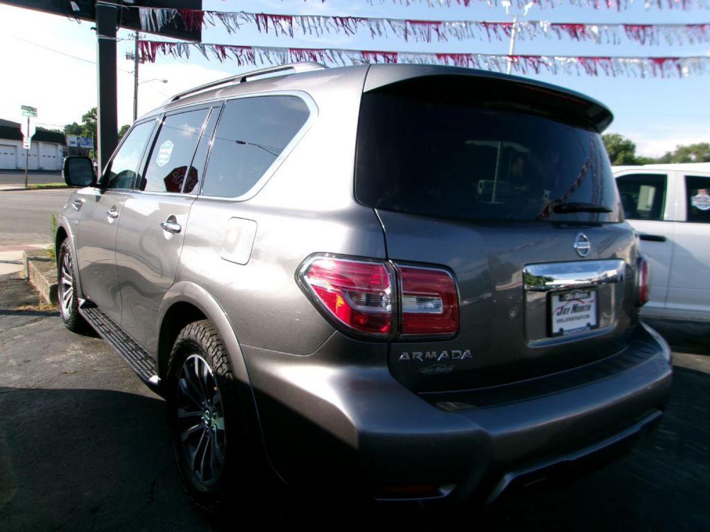 2019 GRAY NISSAN ARMADA SL (JN8AY2NC1K9) with an 5.6L engine, Automatic transmission, located at 501 E. Columbia St., Springfield, OH, 45503, (800) 262-7122, 39.925262, -83.801796 - *** 5.6L V8 *** Premium Package *** Moonroof *** Bose Audio *** Navigation *** 3rd Row Seating *** Clean CarFax w/ 16 Service Records *** Jay North Auto has offered hand picked vehicles since 1965! Our customer's enjoy a NO pressure buying experience with a small town feel. All of our vehicles - Photo#3