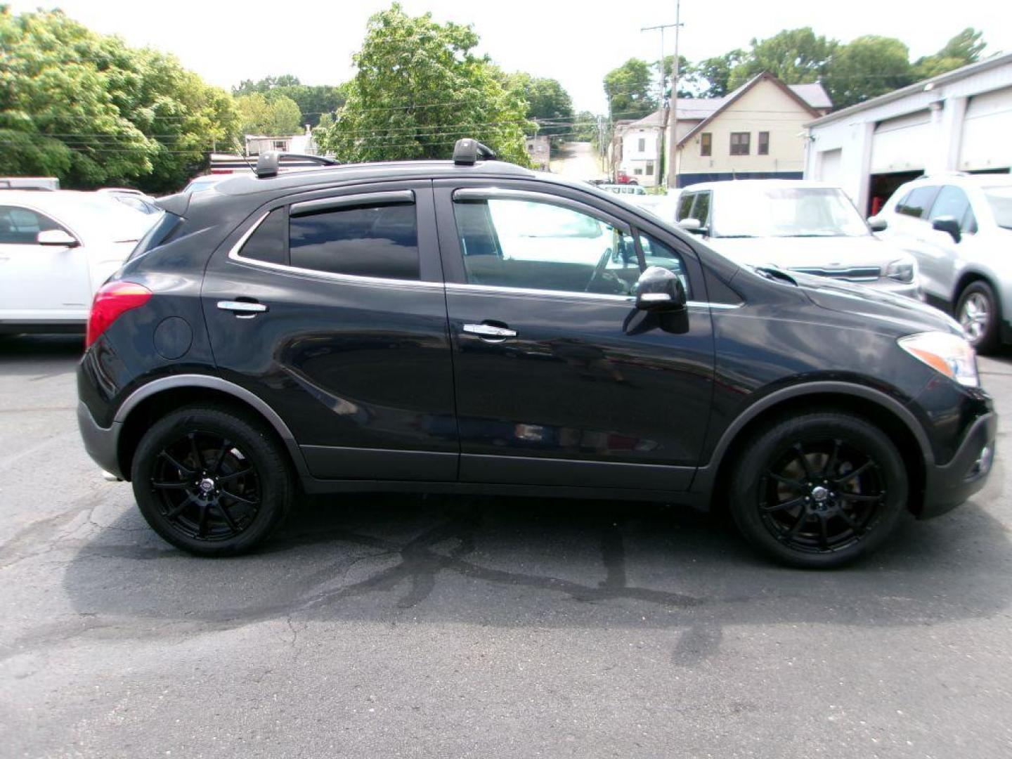 2015 BLACK BUICK ENCORE CONVENIENCE (KL4CJBSB1FB) with an 1.4L engine, Automatic transmission, located at 501 E. Columbia St., Springfield, OH, 45503, (800) 262-7122, 39.925262, -83.801796 - ***CONVENIENCE PACKAGE***FWD***1.4L***Gas Saver***Serviced and Detailed*** Jay North Auto has offered hand picked vehicles since 1965! Our customer's enjoy a NO pressure buying experience with a small town feel. All of our vehicles get fully inspected and detailed. We are a preferred dealer for - Photo#1