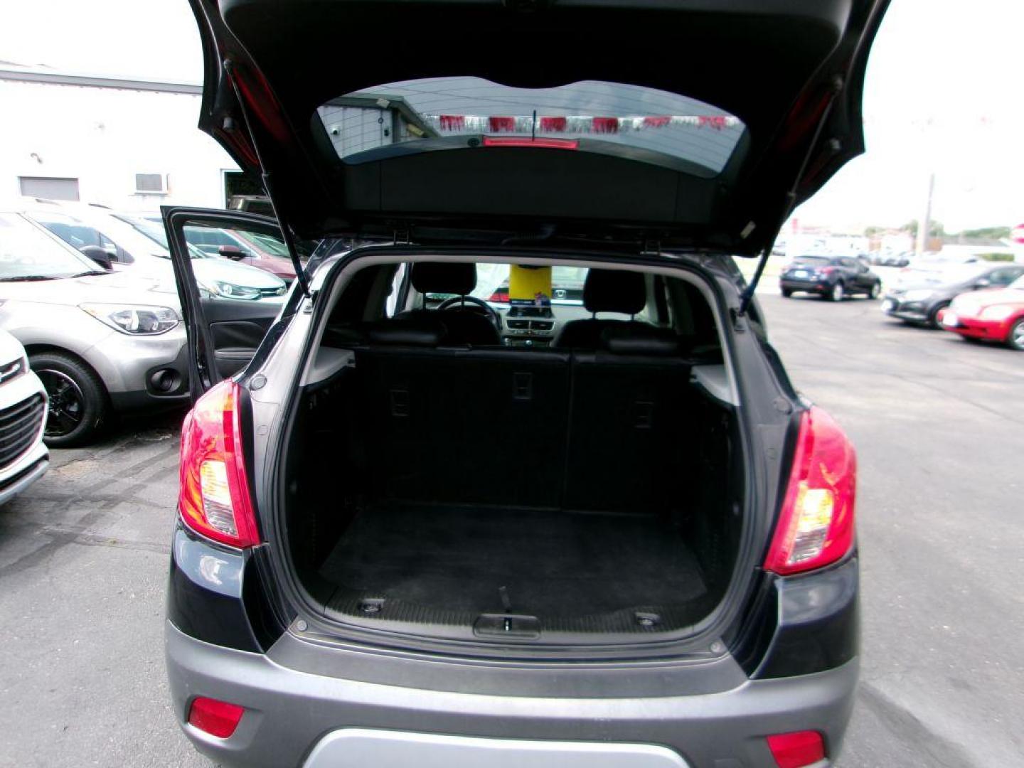 2015 BLACK BUICK ENCORE CONVENIENCE (KL4CJBSB1FB) with an 1.4L engine, Automatic transmission, located at 501 E. Columbia St., Springfield, OH, 45503, (800) 262-7122, 39.925262, -83.801796 - ***CONVENIENCE PACKAGE***FWD***1.4L***Gas Saver***Serviced and Detailed*** Jay North Auto has offered hand picked vehicles since 1965! Our customer's enjoy a NO pressure buying experience with a small town feel. All of our vehicles get fully inspected and detailed. We are a preferred dealer for - Photo#7