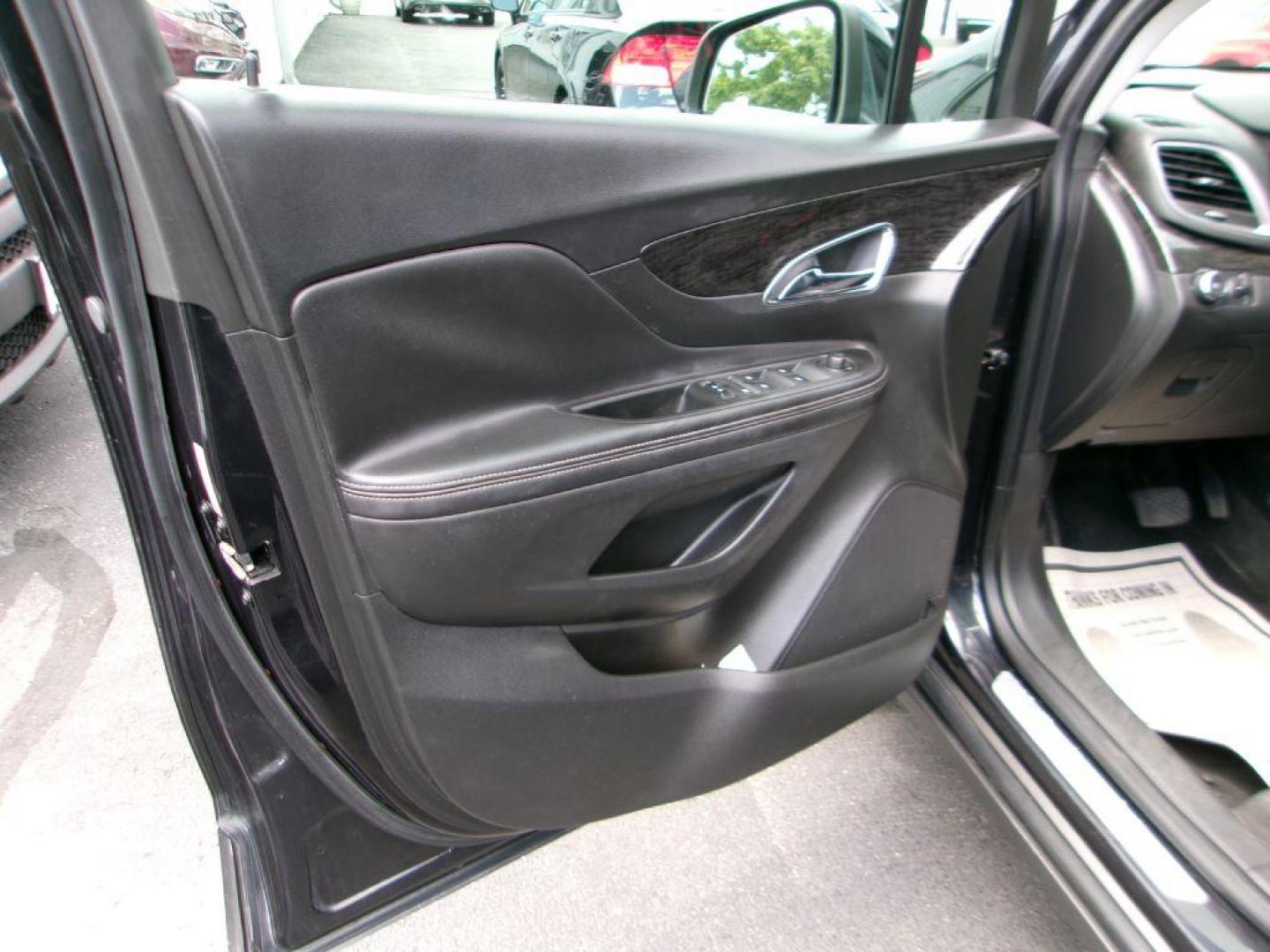 2015 BLACK BUICK ENCORE CONVENIENCE (KL4CJBSB1FB) with an 1.4L engine, Automatic transmission, located at 501 E. Columbia St., Springfield, OH, 45503, (800) 262-7122, 39.925262, -83.801796 - ***CONVENIENCE PACKAGE***FWD***1.4L***Gas Saver***Serviced and Detailed*** Jay North Auto has offered hand picked vehicles since 1965! Our customer's enjoy a NO pressure buying experience with a small town feel. All of our vehicles get fully inspected and detailed. We are a preferred dealer for - Photo#11
