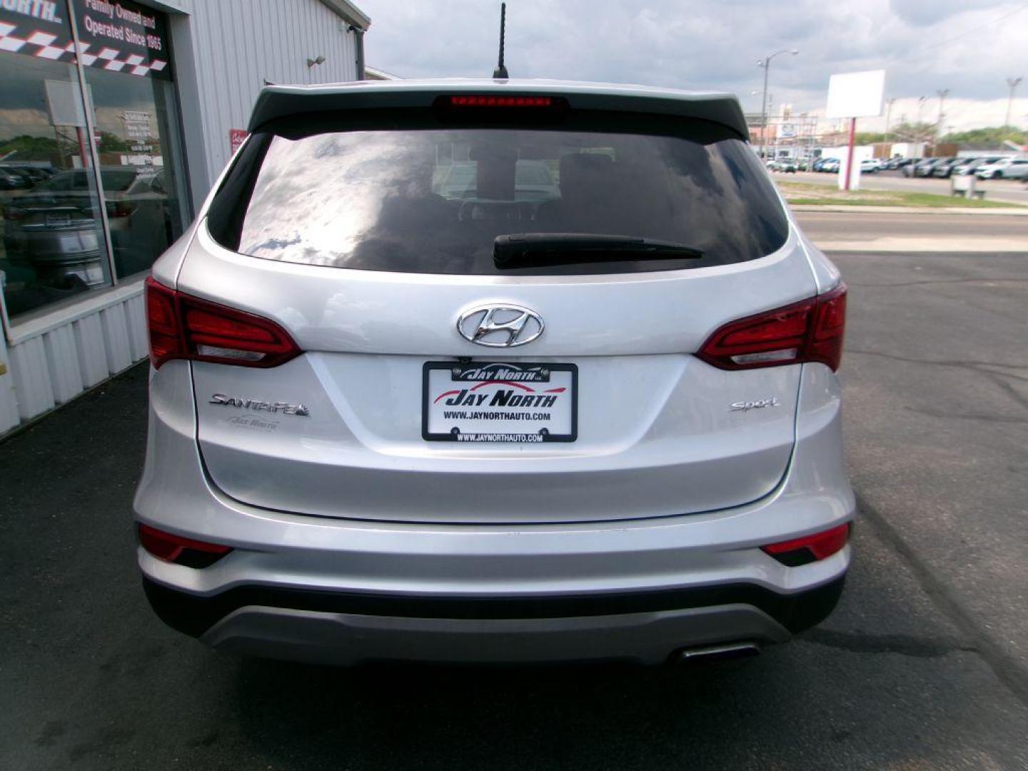 2018 SILVER HYUNDAI SANTA FE SPORT (5XYZT3LB0JG) with an 2.4L engine, Automatic transmission, located at 501 E. Columbia St., Springfield, OH, 45503, (800) 262-7122, 39.925262, -83.801796 - ***SPORT***New Tires***New Rear Brake Pads and Rotors*** Tune Up ***Serviced and Detailed*** Jay North Auto has offered hand picked vehicles since 1965! Our customer's enjoy a NO pressure buying experience with a small town feel. All of our vehicles get fully inspected and detailed. We are a pre - Photo#5
