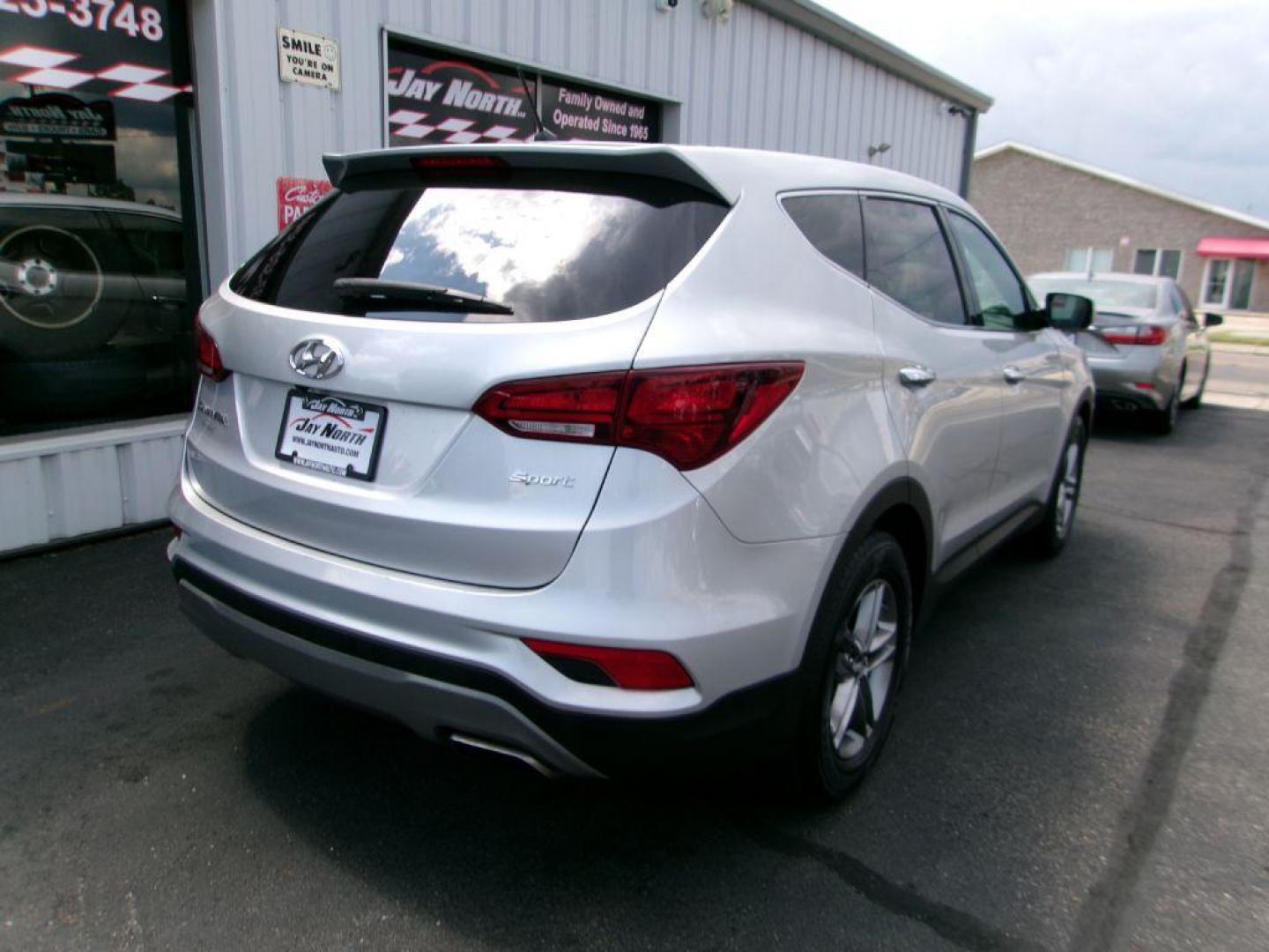 2018 SILVER HYUNDAI SANTA FE SPORT (5XYZT3LB0JG) with an 2.4L engine, Automatic transmission, located at 501 E. Columbia St., Springfield, OH, 45503, (800) 262-7122, 39.925262, -83.801796 - ***SPORT***New Tires***New Rear Brake Pads and Rotors*** Tune Up ***Serviced and Detailed*** Jay North Auto has offered hand picked vehicles since 1965! Our customer's enjoy a NO pressure buying experience with a small town feel. All of our vehicles get fully inspected and detailed. We are a pre - Photo#6